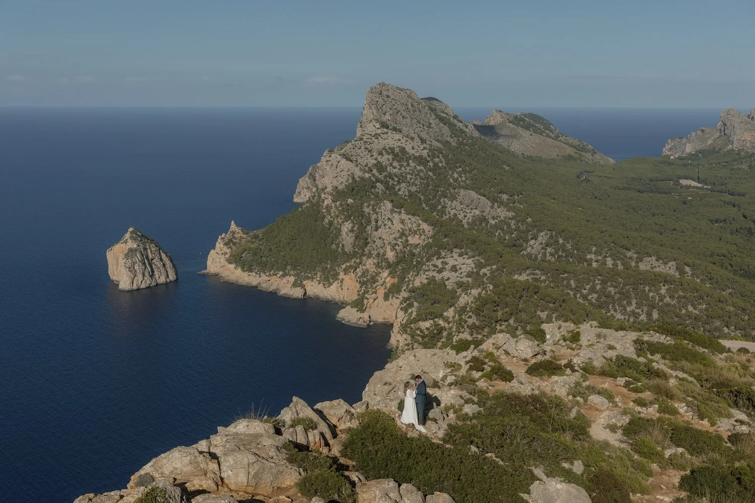 Adventure elopement in Cap de Formentor Mallorca with stunning cliffside views and deep blue sea – luxury destination wedding photography in Spain