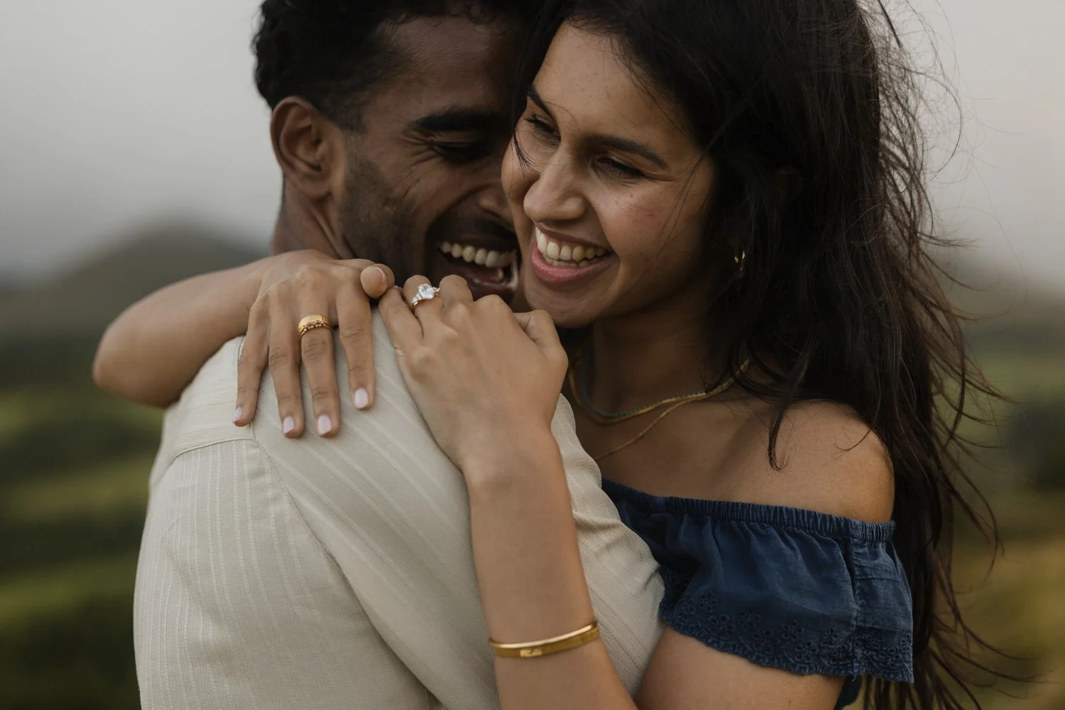 couple hugging and smiling after engagement in São Miguel Azores
