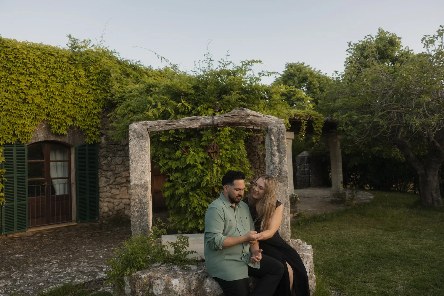 Couple sharing a quiet moment at a traditional Mallorcan finca during their two-day elopement.