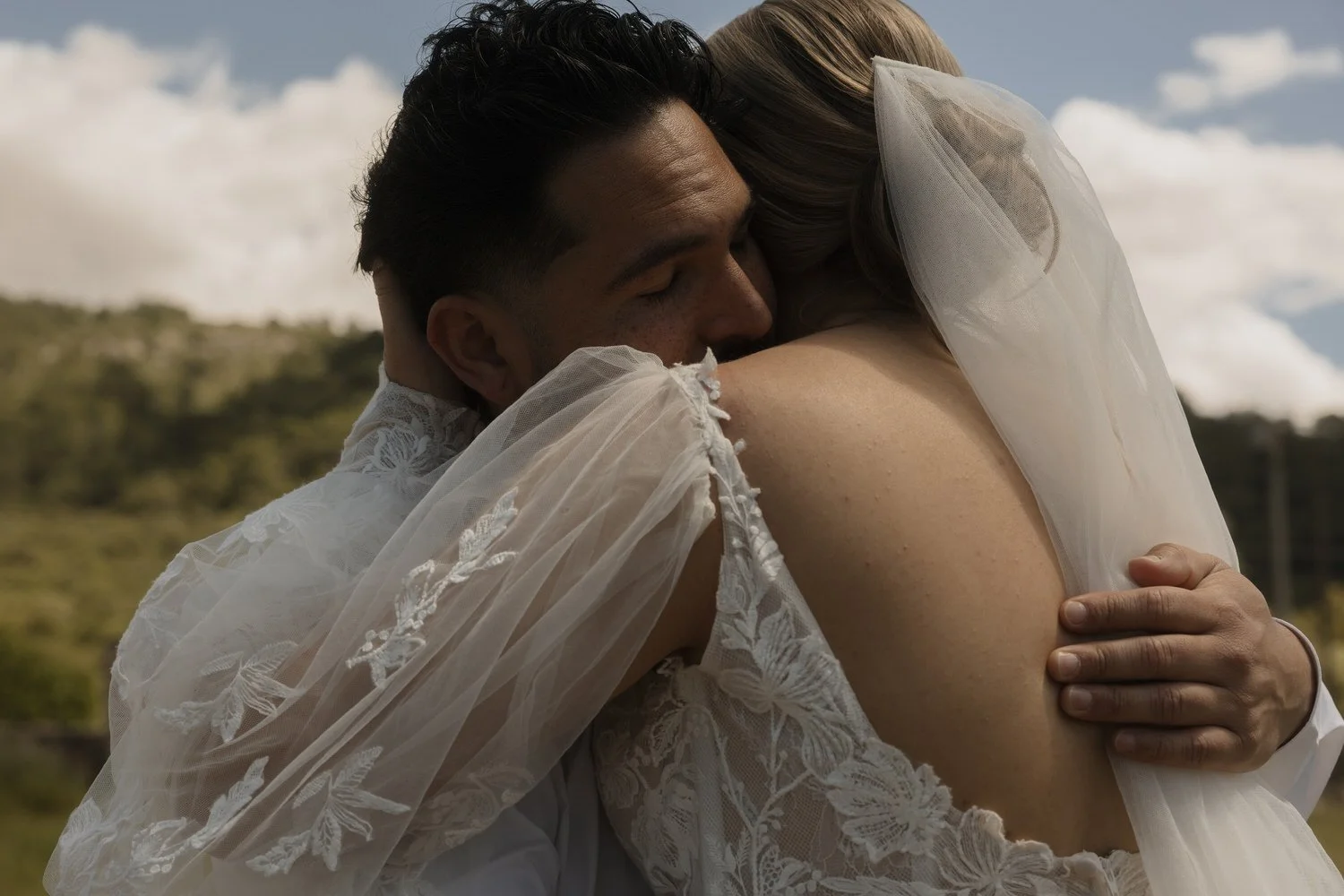 Bride and groom sharing an emotional embrace during their intimate Mallorca wedding