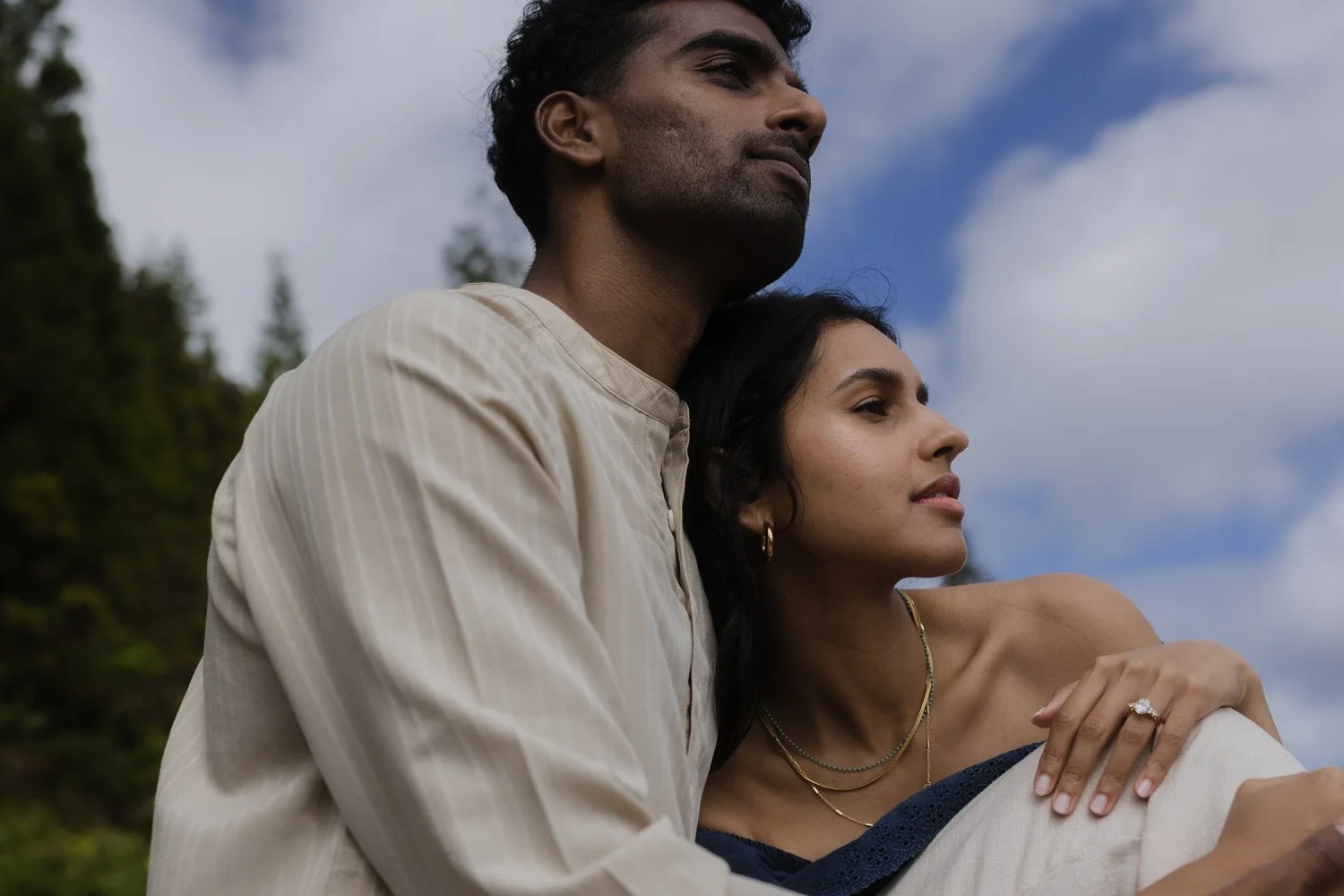 Engaged couple embracing during romantic engagement session in São Miguel Azores