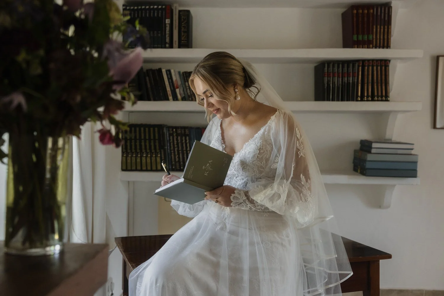 Close-up of the bride writing her wedding vows before the ceremony in Mallorca