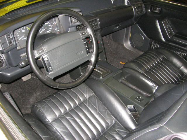 The trained eye can spot a low mile car. Tight seat bolsters, good leather on the steering wheel, pedals that aren't worn, stock radio, etc.