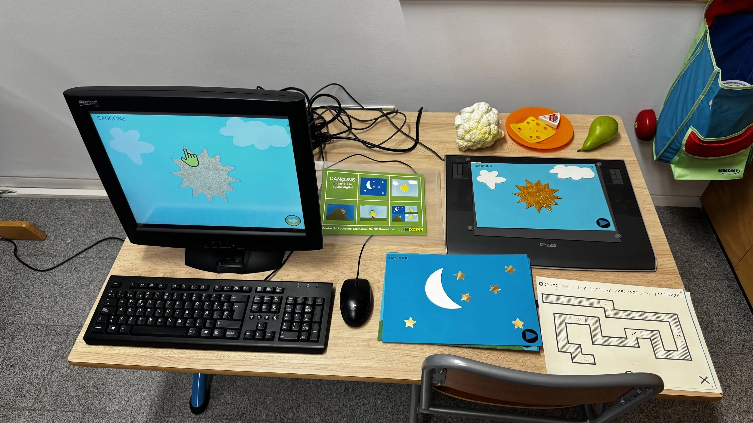 Desktop computer and tactile items to facilitate learning to program.