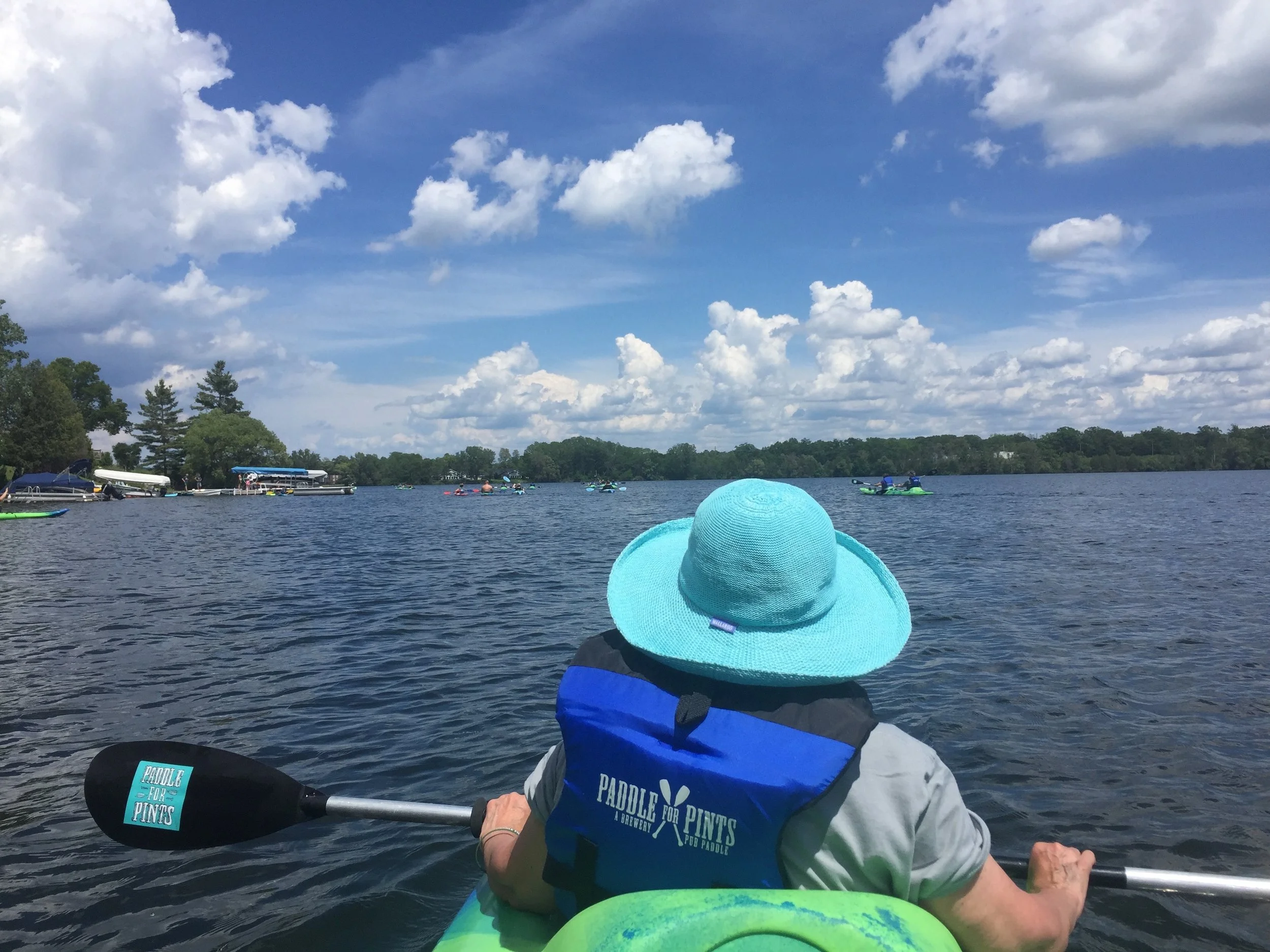 The tour began on the Boardman Lake, where the group did the “Paddle for Pints” on a sunny Friday afternoon. Paddlers experience different TC brew pubs via a water trail.