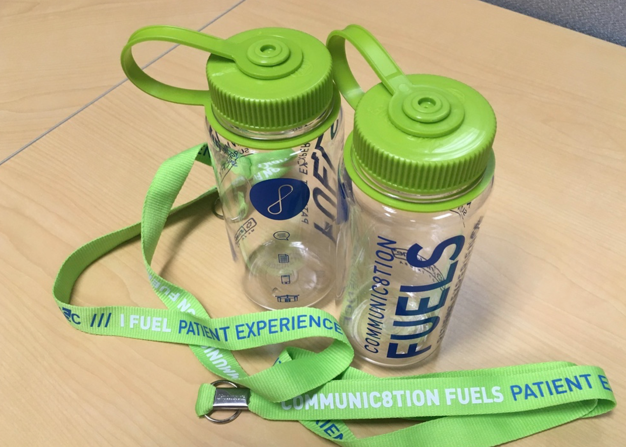 Participants each received a water bottle and lanyard as reminders of the event; lanyards are worn every day by every member of staff, and were designed to start conversations with patients and families.