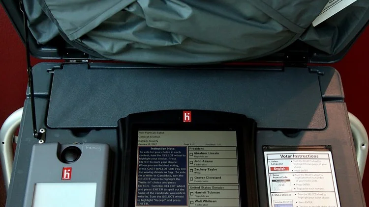 Voting machine maker sues to block rival companies' paper-using devices
