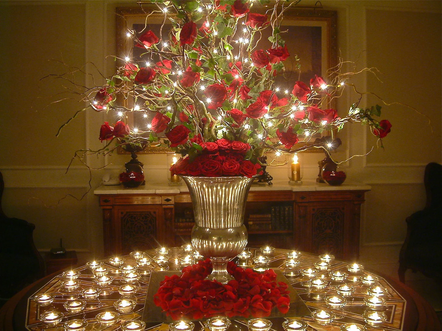  Diwali Illuminated Arrangement: Grand Prix roses with twisted willow &amp; tiny p-lights 