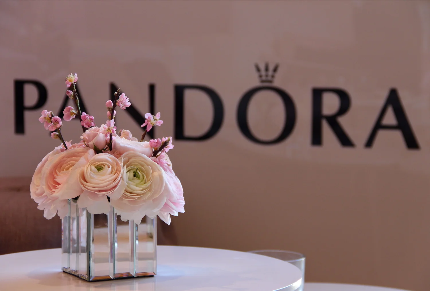  Pandora Press Event, Afternoon Tea: Delicate pink ranunculus and cherry blossom arrangements 