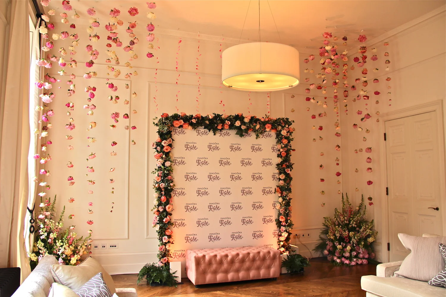  Pandora: Rose Gold Collection Launch : Vintage Rose Step and Repeat flanked by hanging Peoney and Rose installations 