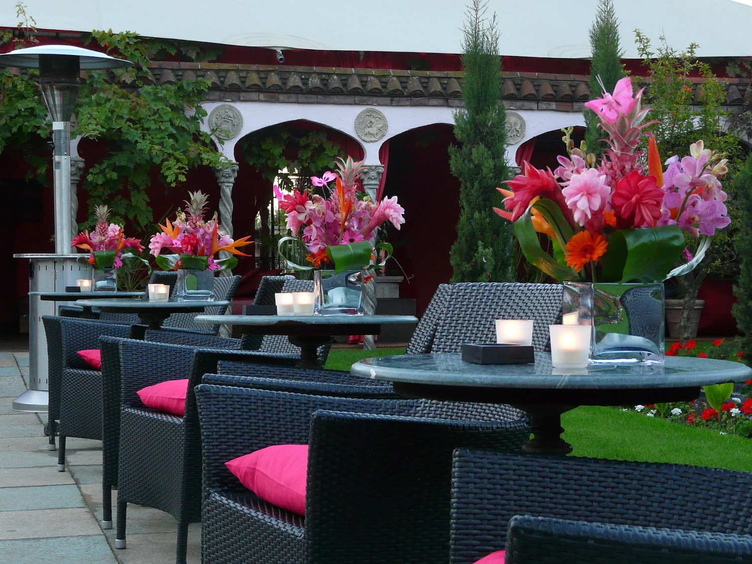  Caribbean Event: The Roof Gardens. Vibrant tropical arrangements - to counteract the grey skies above! 