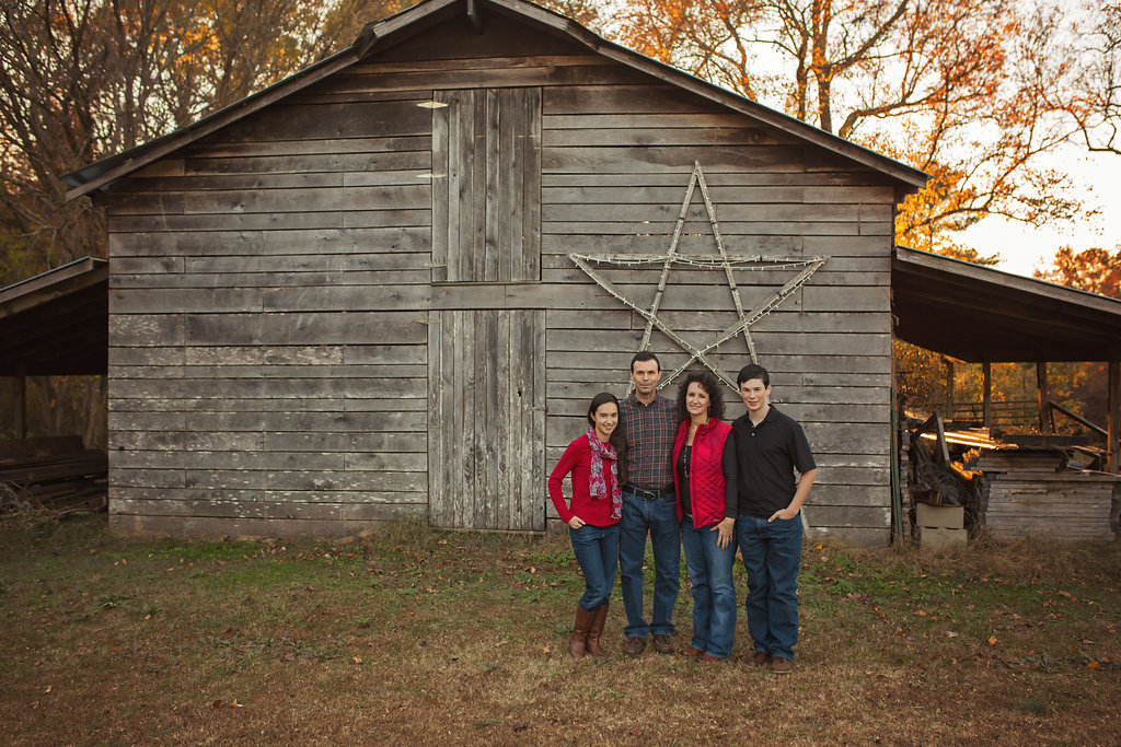  Candace photographs Pinehurst NC family in field with barn.&nbsp; 