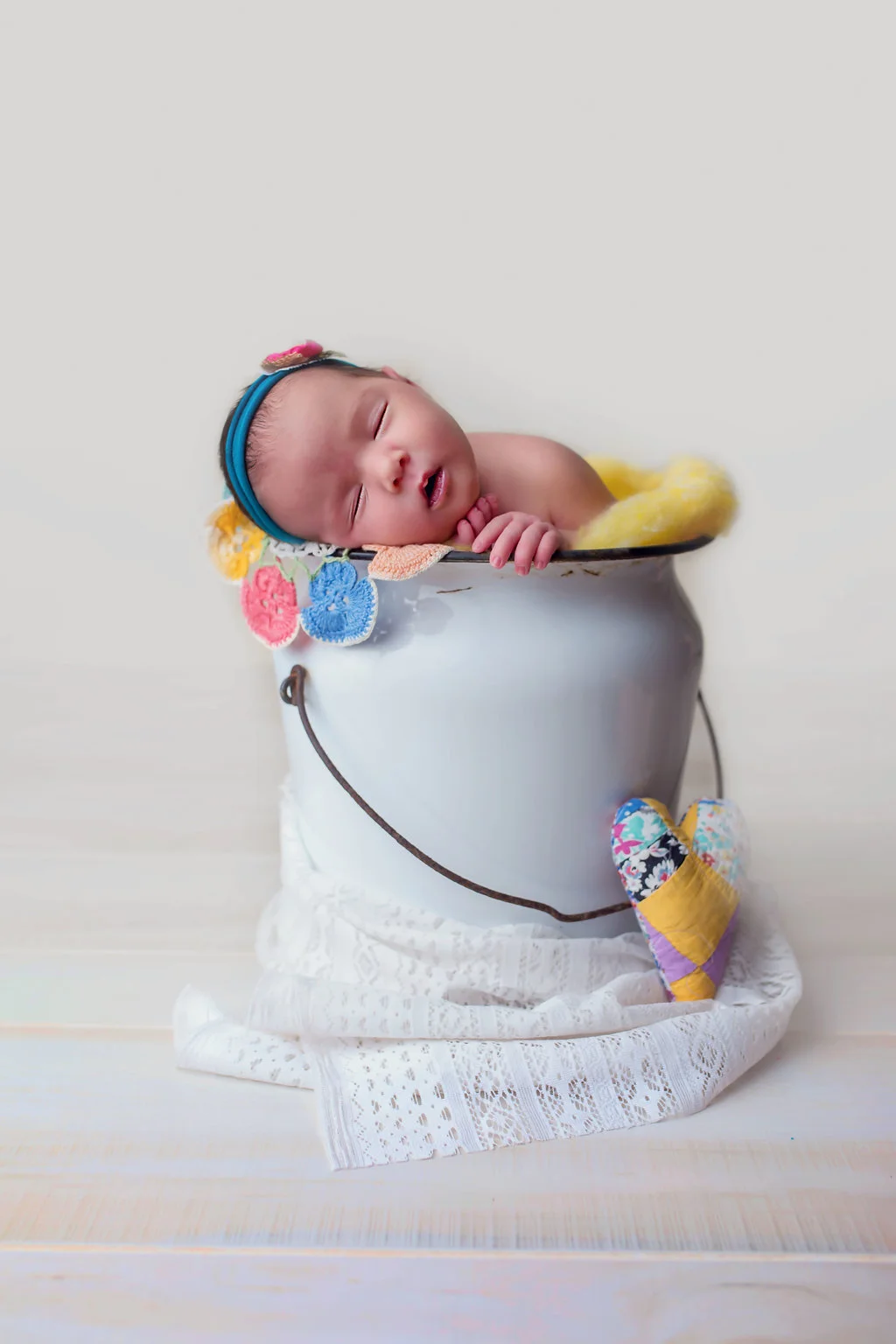 Photograph of Baby in white bucket 