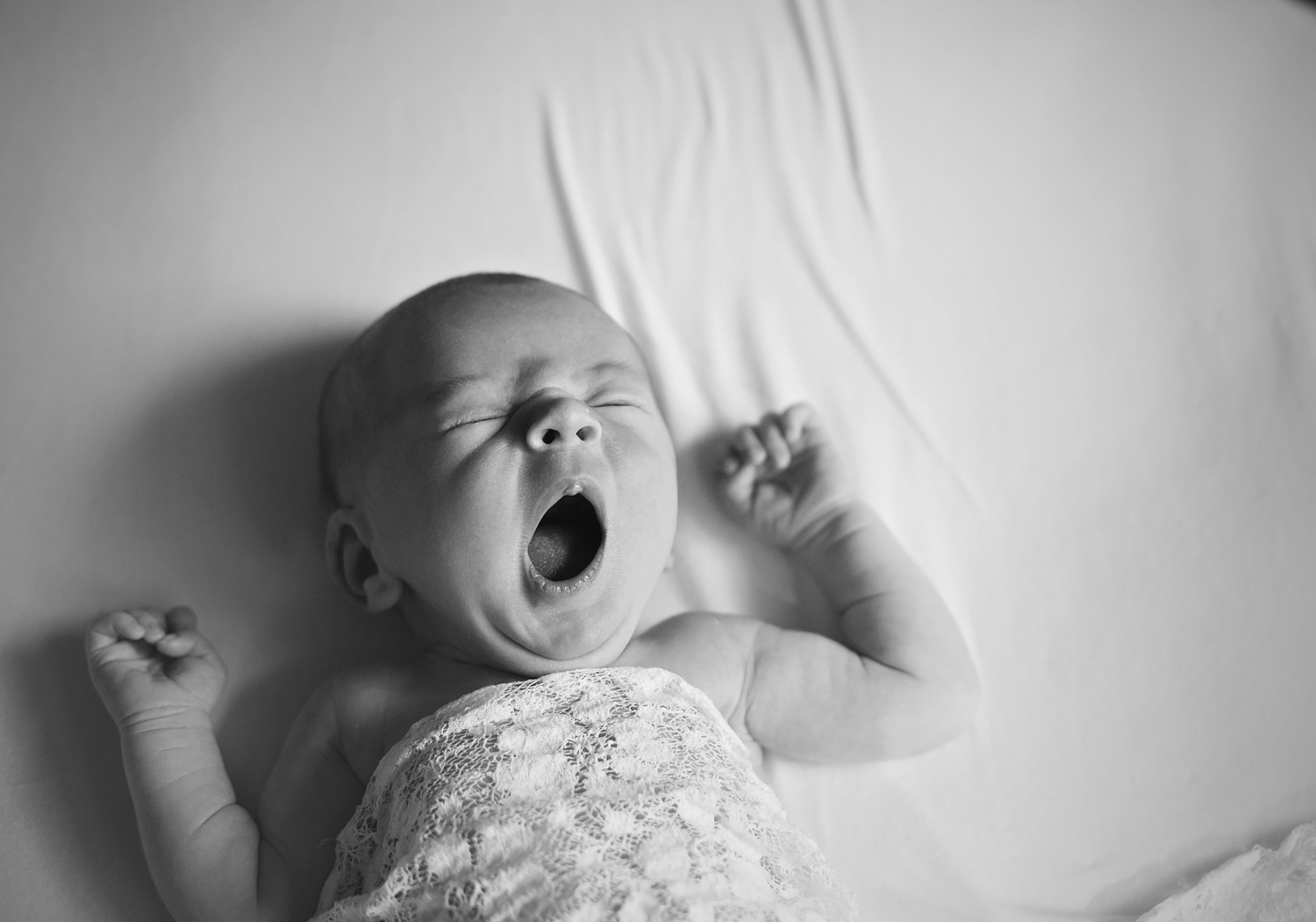 Baby yawns.