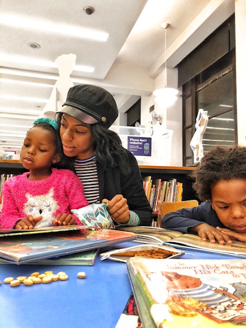 Denise and her daughter are pictured with their Bumkins Reusable Snack Bag , Small (in Quill), at their local library.