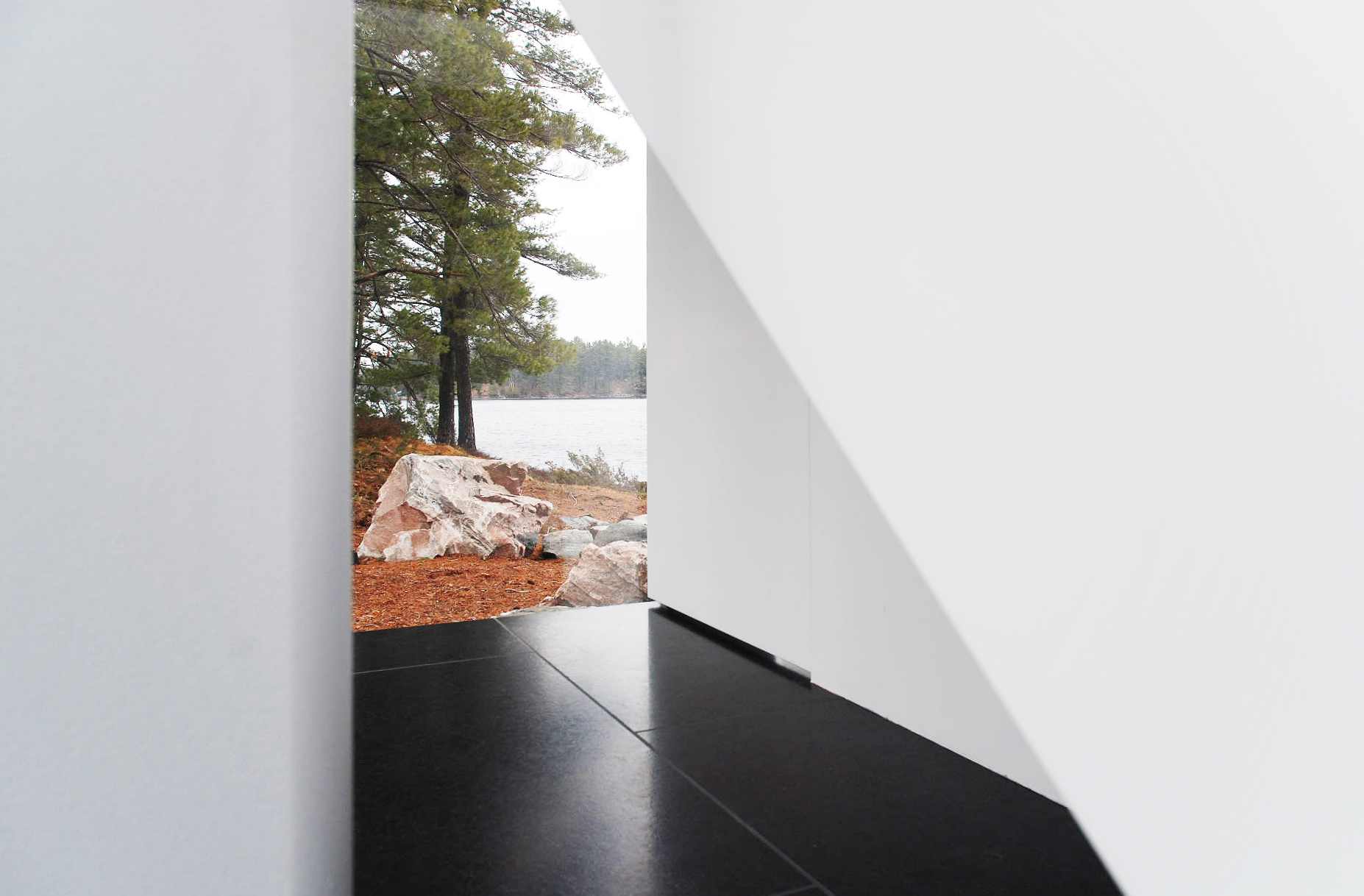 Glass Boat House - Stair Well Black Stone