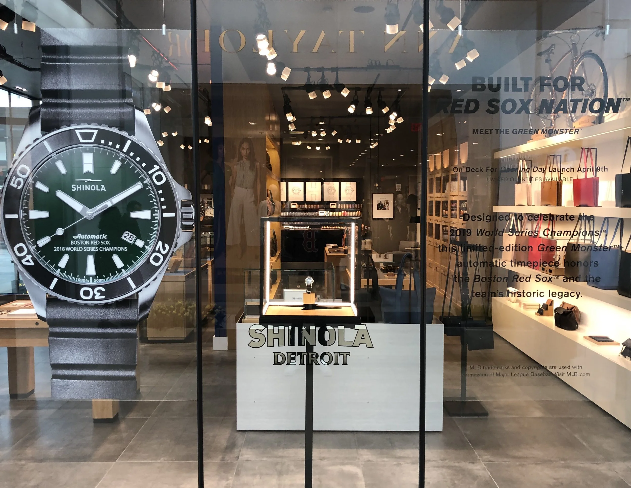 End result of window display using decals adhered to plexiglass.