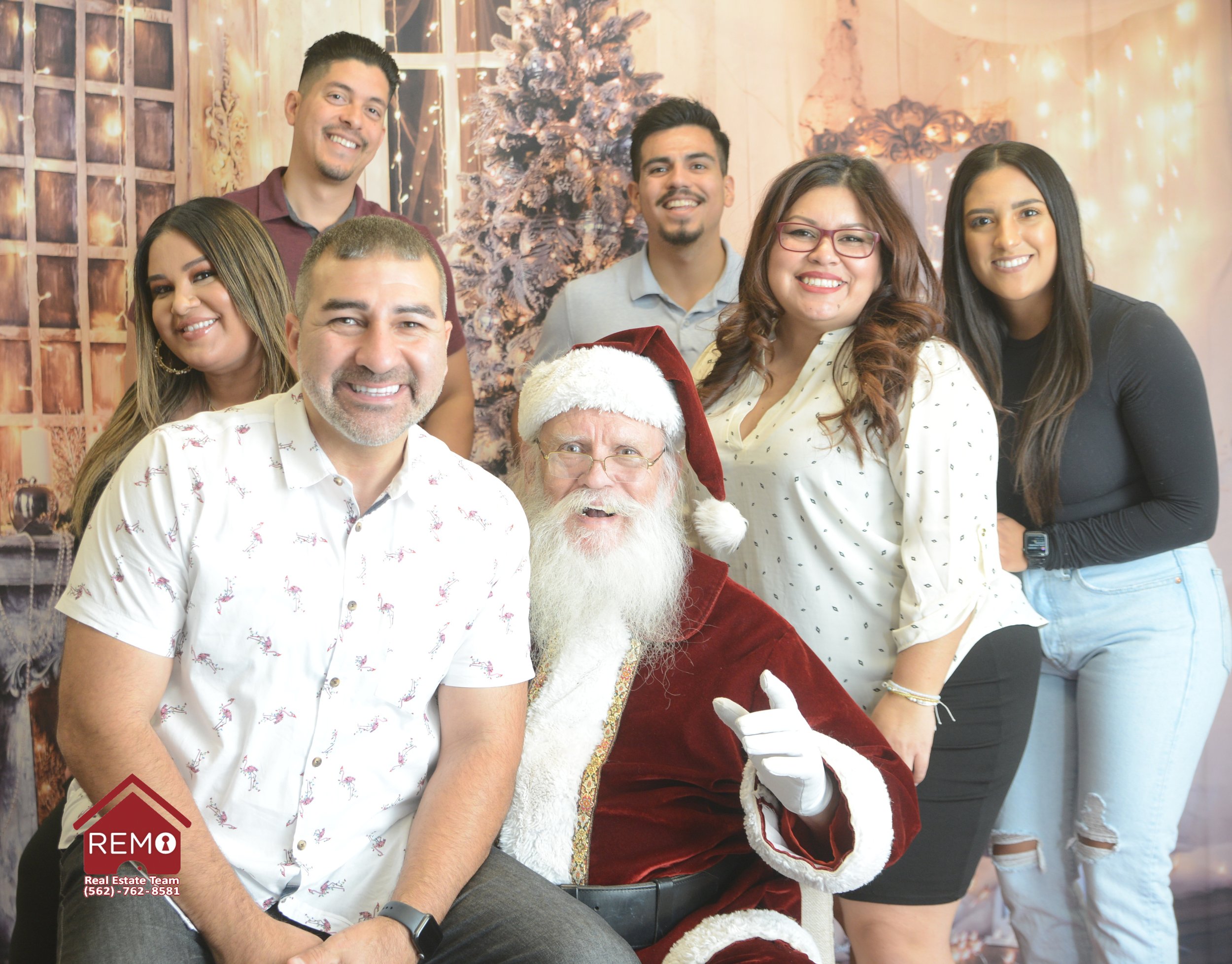 Team Remo Photo w Santa 2022.jpg