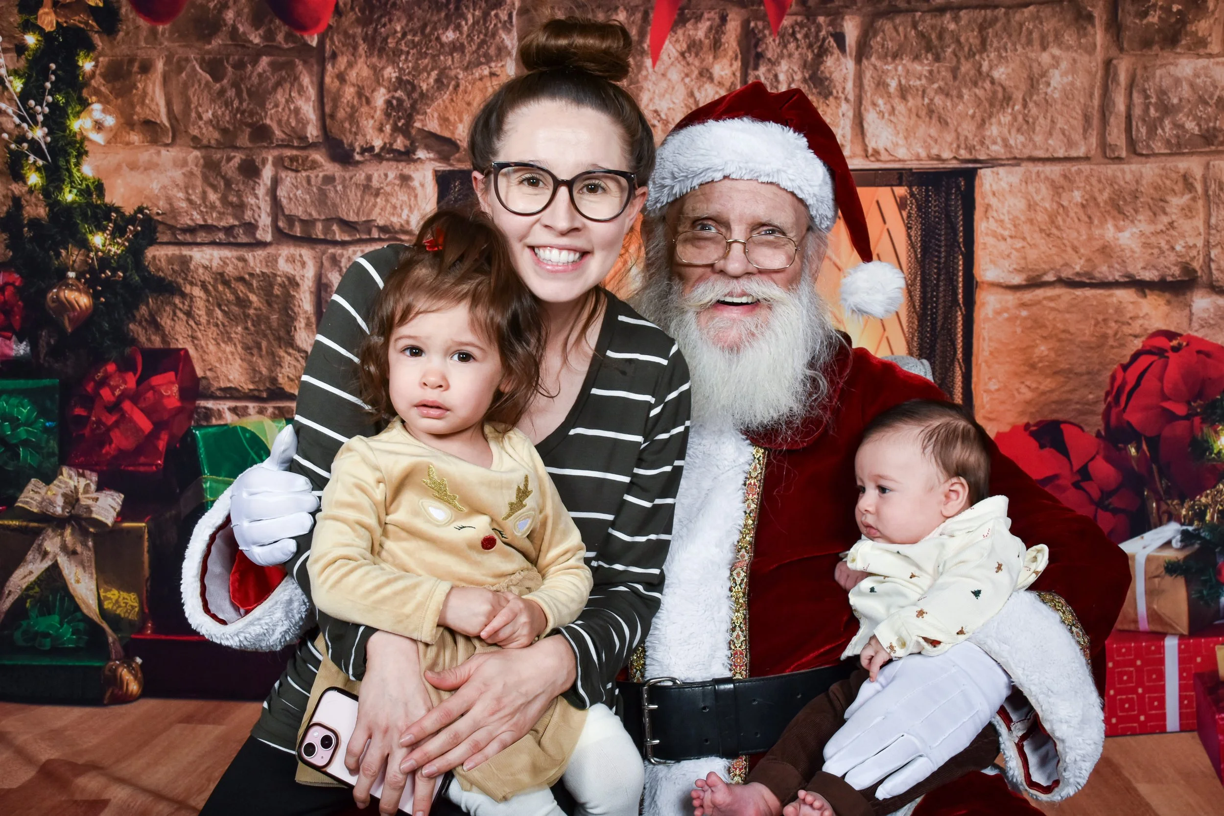 Team Remo Photos with Santa 2025 - Gomez Family 1.jpg