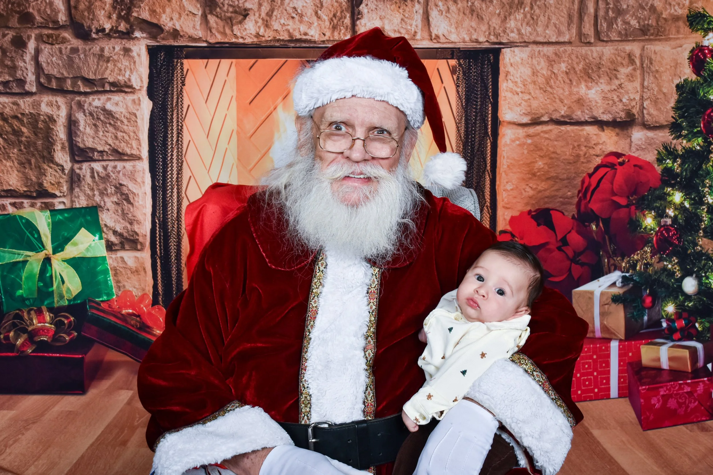 Team Remo Photos with Santa 2025 - Gomez Family 2.jpg