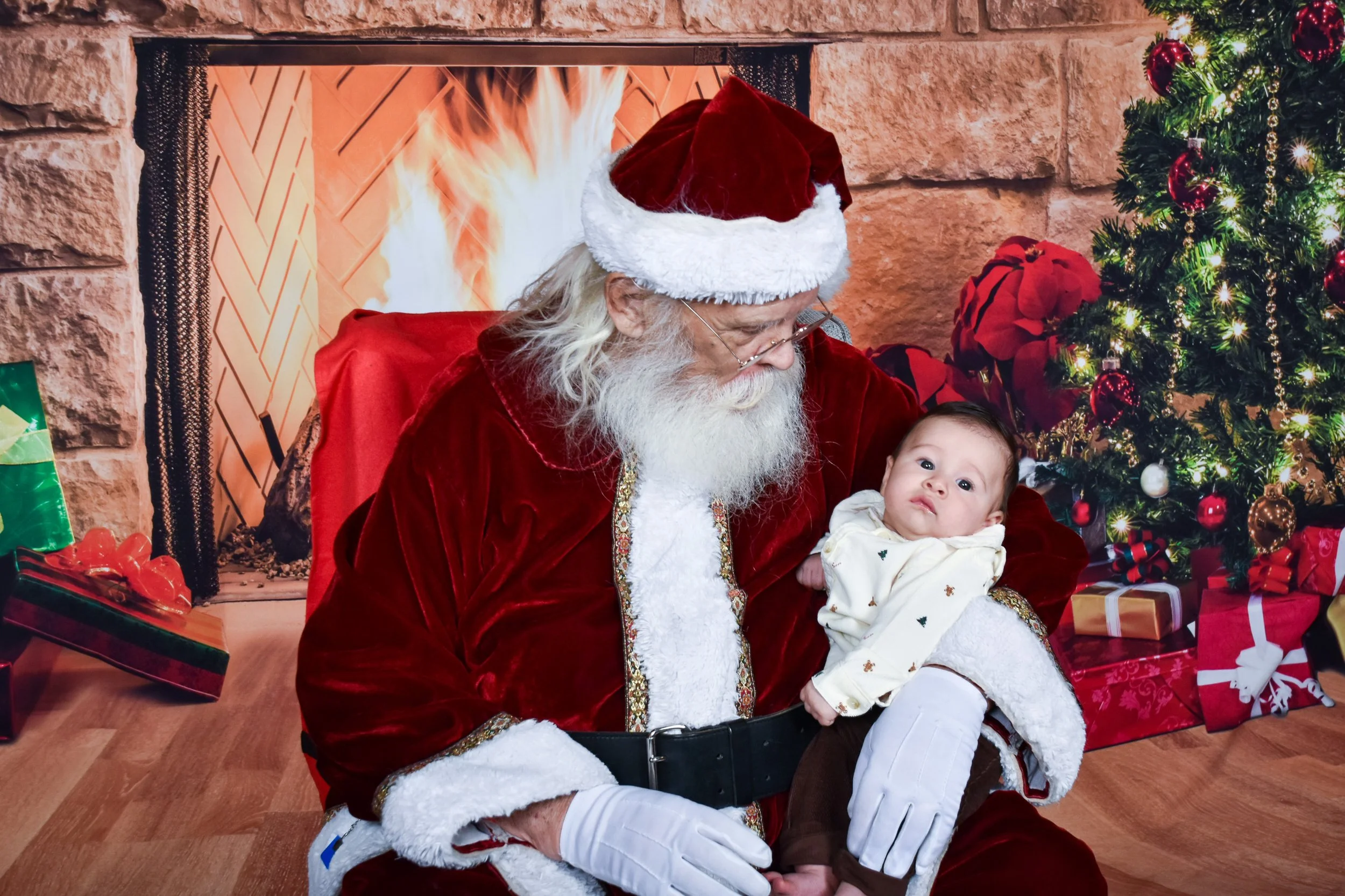 Team Remo Photos with Santa 2025 - Gomez Family 3.jpg