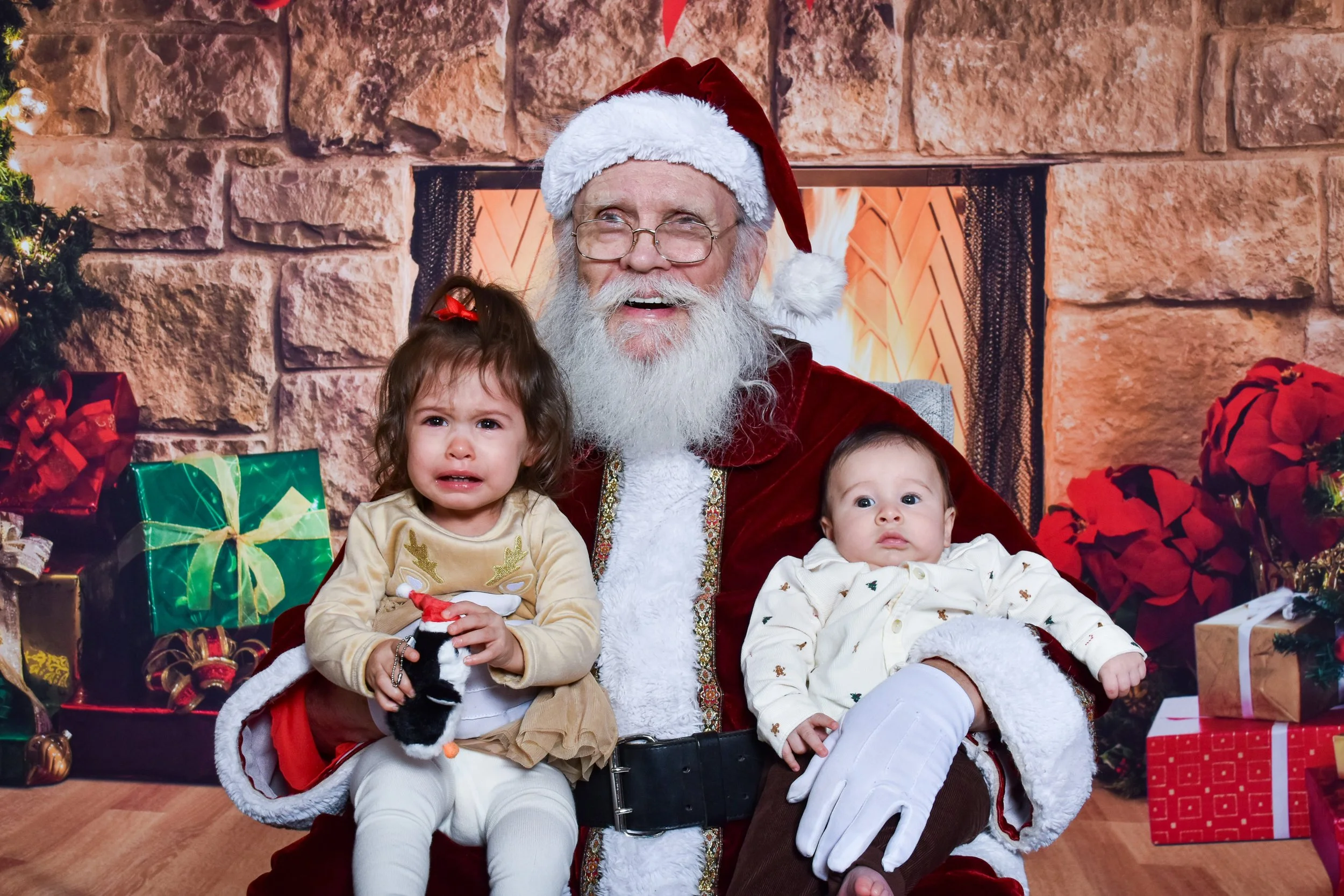 Team Remo Photos with Santa 2025 - Gomez Family 6.jpg