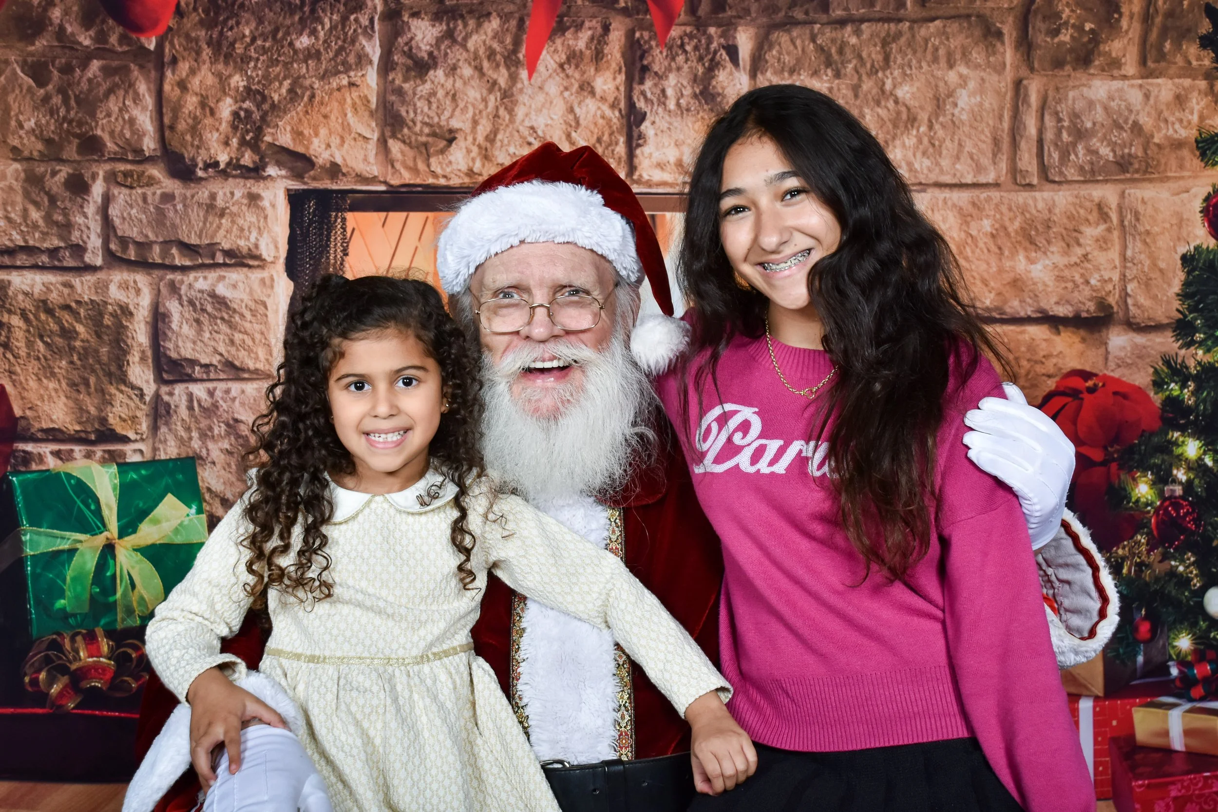 Team Remo Photos with Santa 2025 - Henein Family 3.jpg
