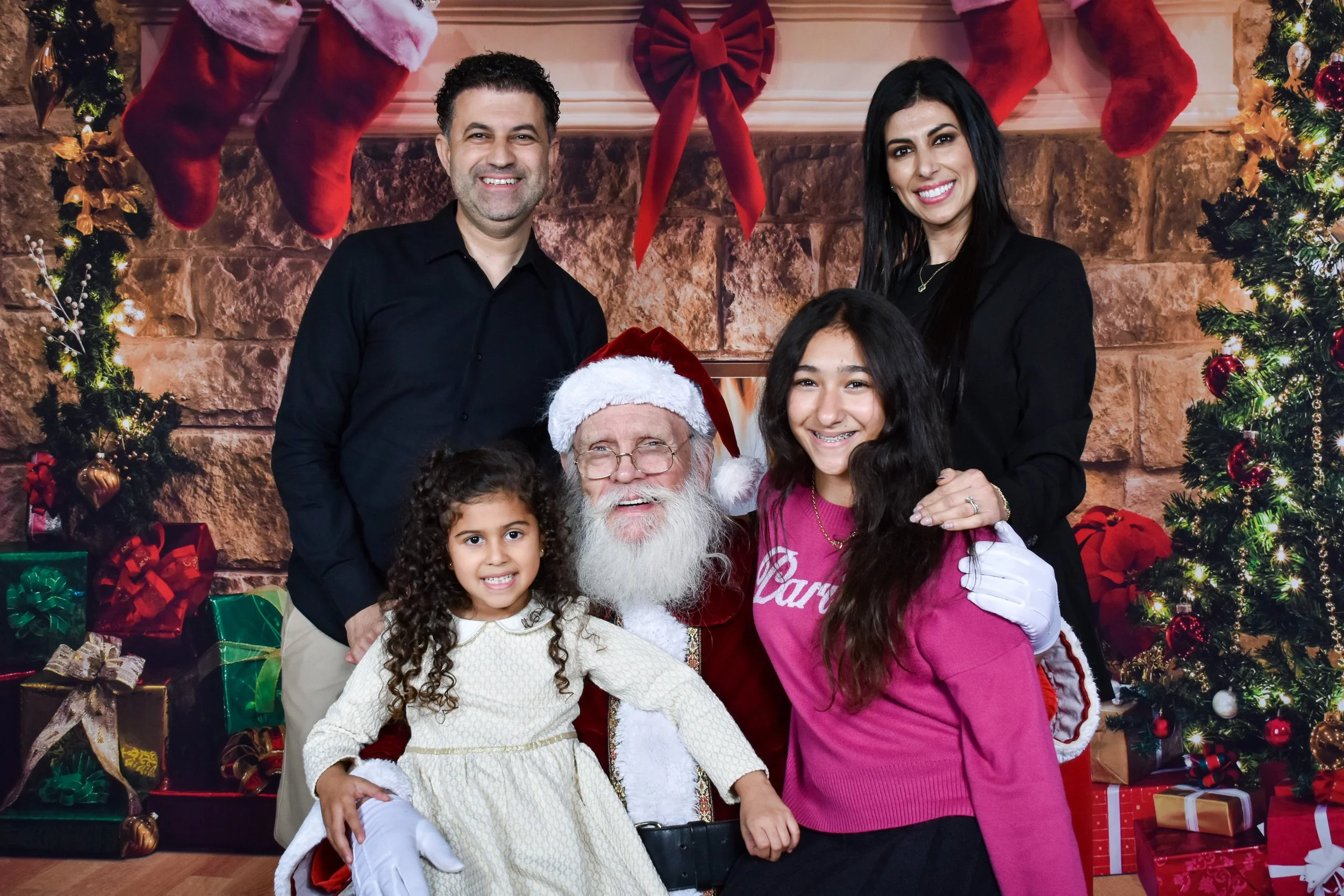Team Remo Photos with Santa 2025 - Henein Family.jpg
