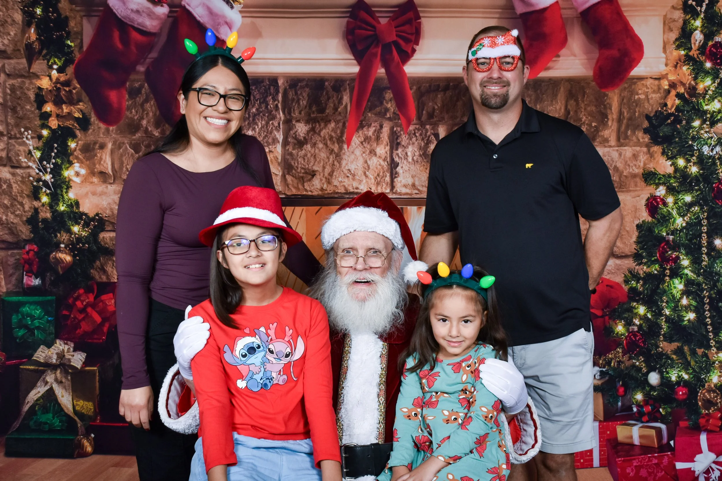 Team Remo Photos with Santa 2025 - Hernandez Family 1.jpg