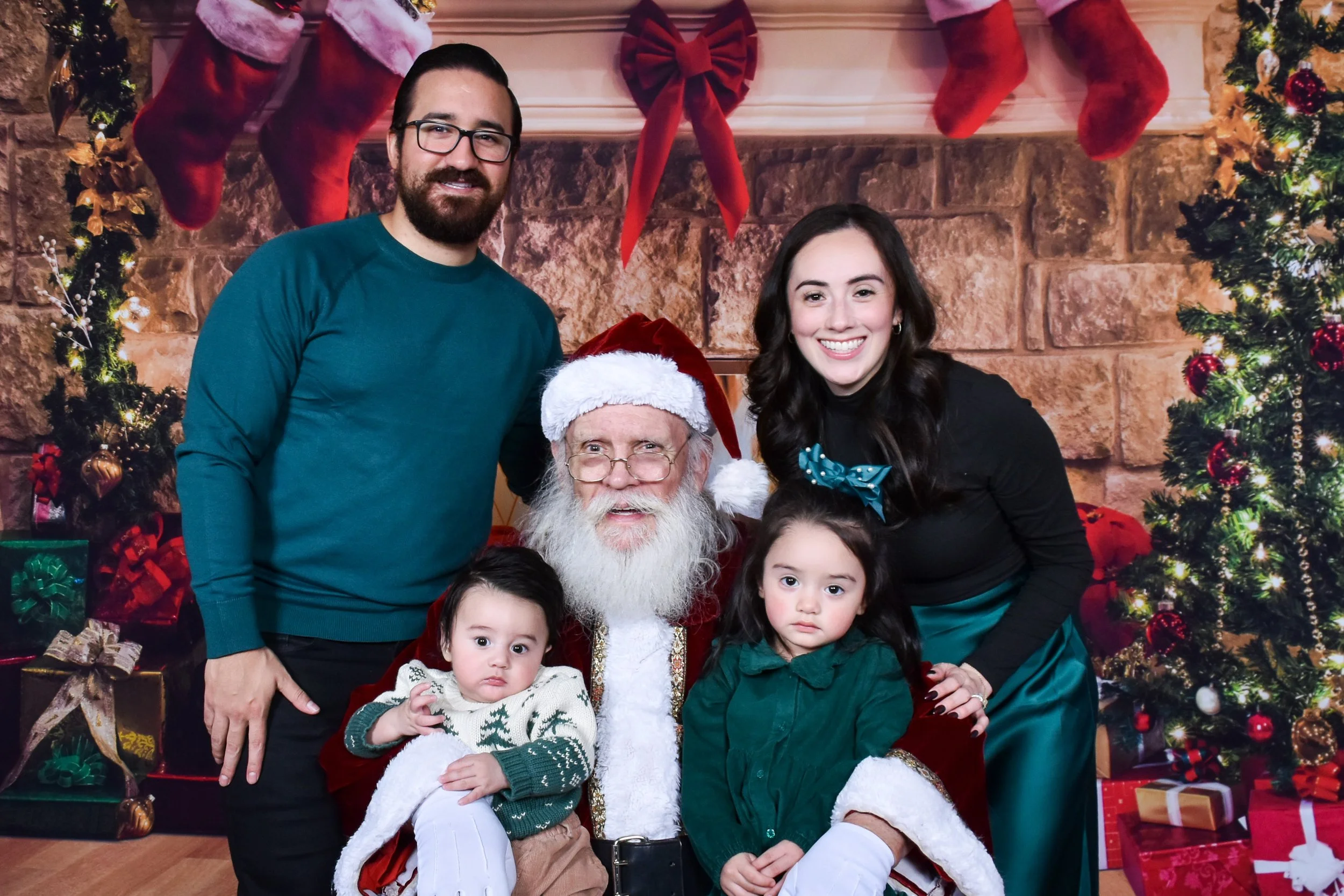 Team Remo Photos with Santa 2025 - Huitron Family 2.jpg