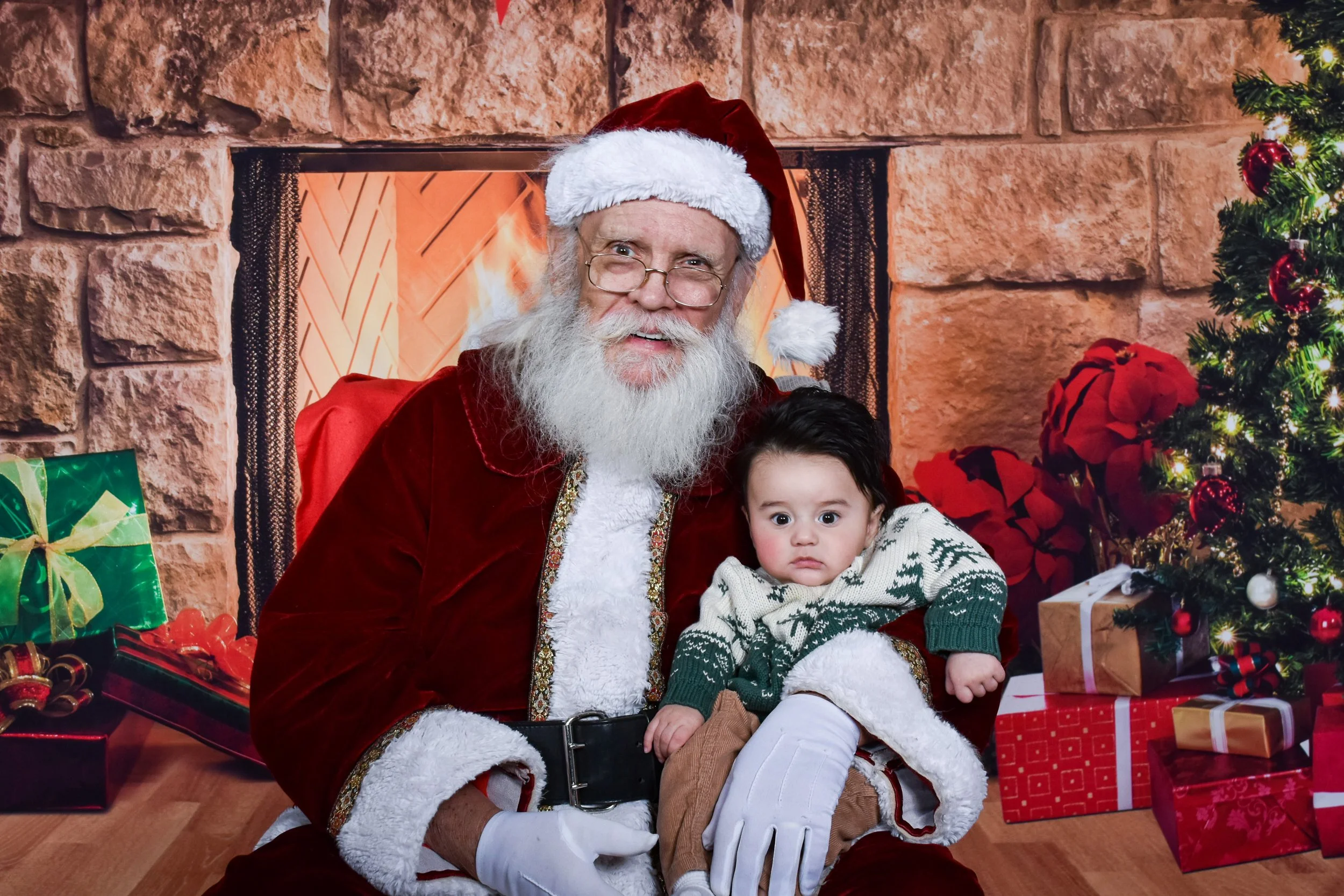 Team Remo Photos with Santa 2025 - Huitron Family 6.jpg