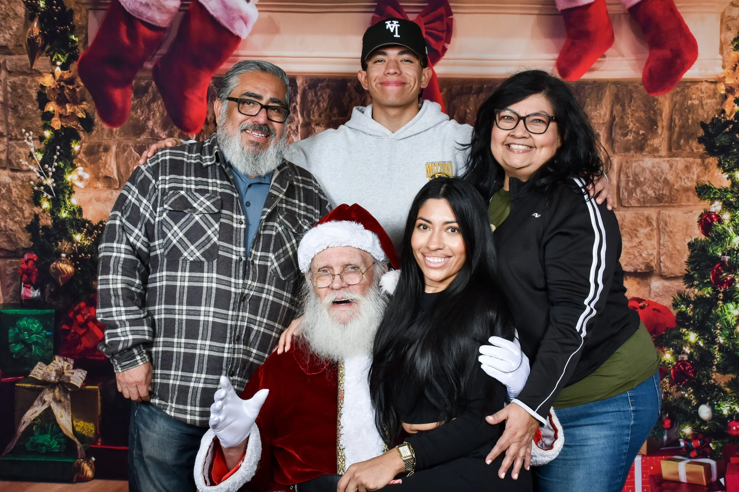 Team Remo Photos with Santa 2025 - Martinez Family 3.jpg
