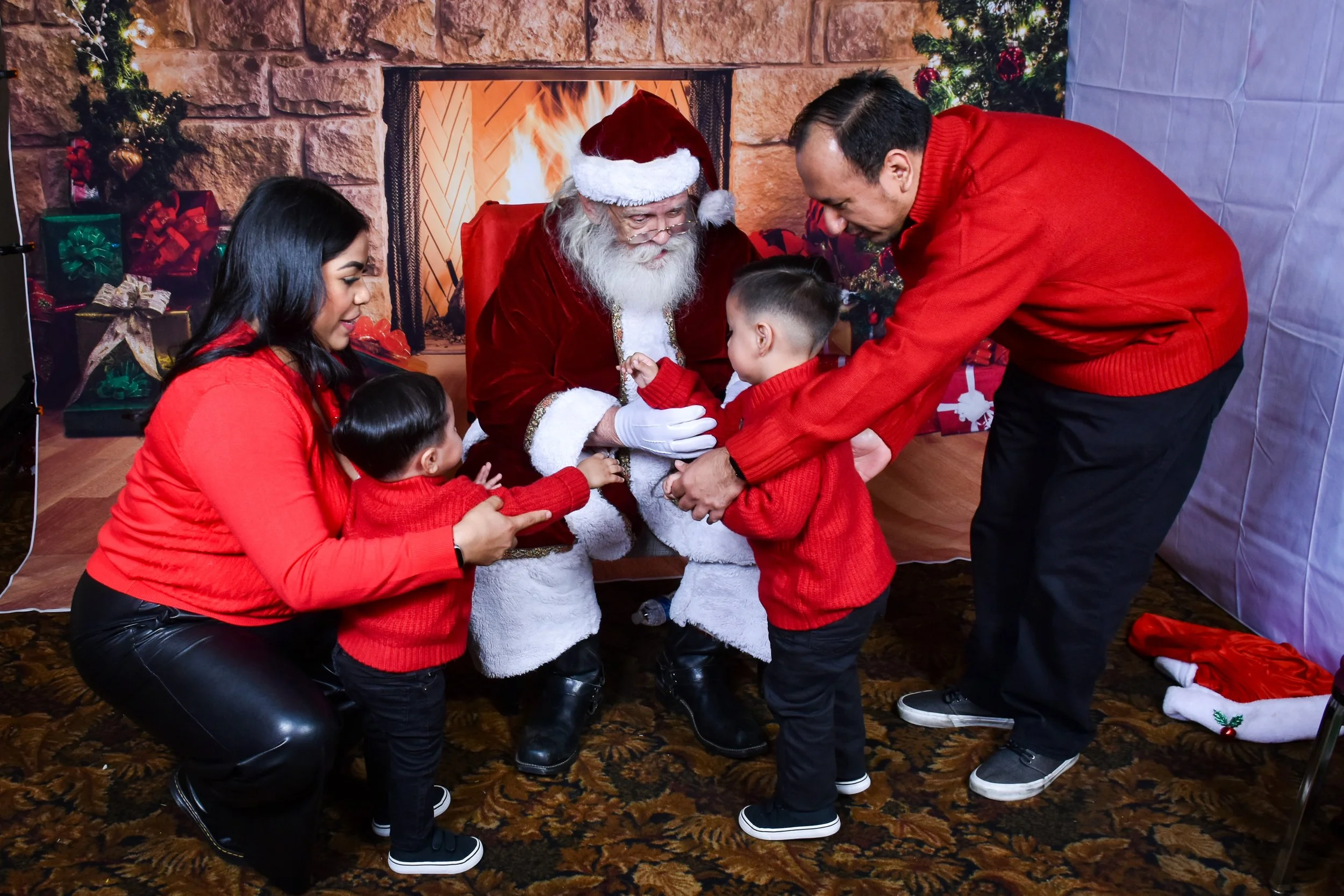 Team Remo Photos with Santa 2025 - Miramontes Family 1.jpg