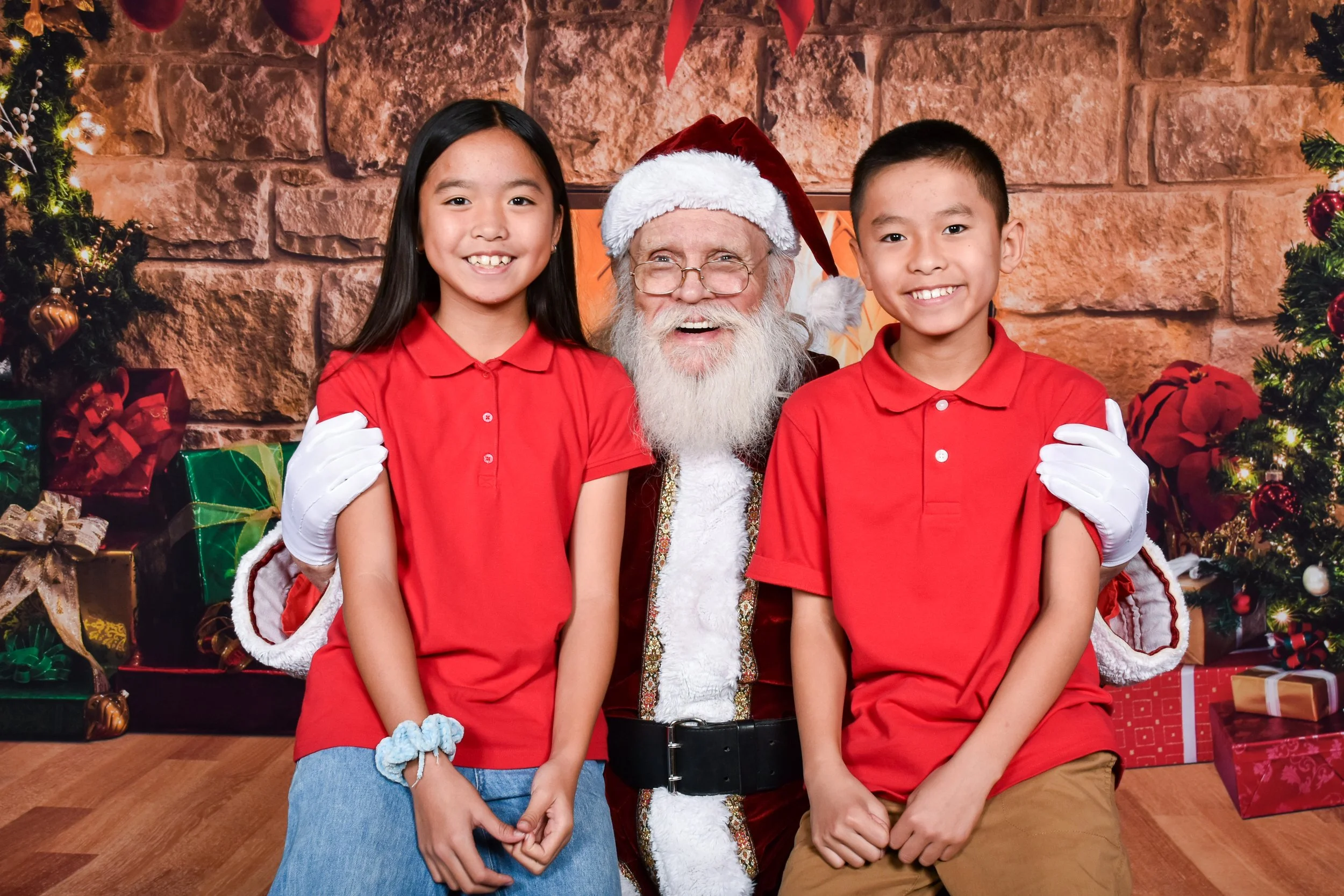 Team Remo Photos with Santa 2025 - Nguyen Family 1.jpg