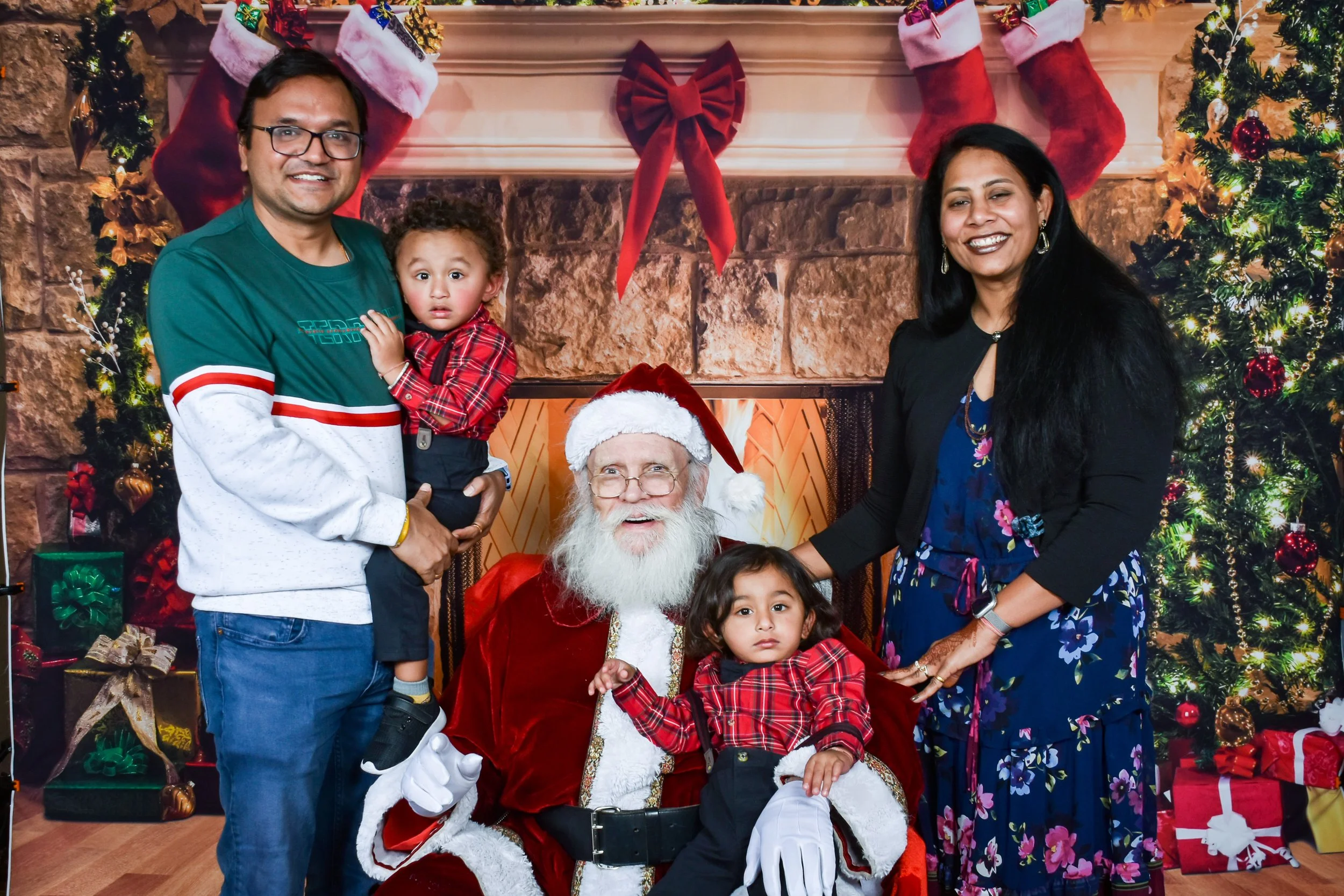 Team Remo Photos with Santa 2025 - Patel Family 2.jpg