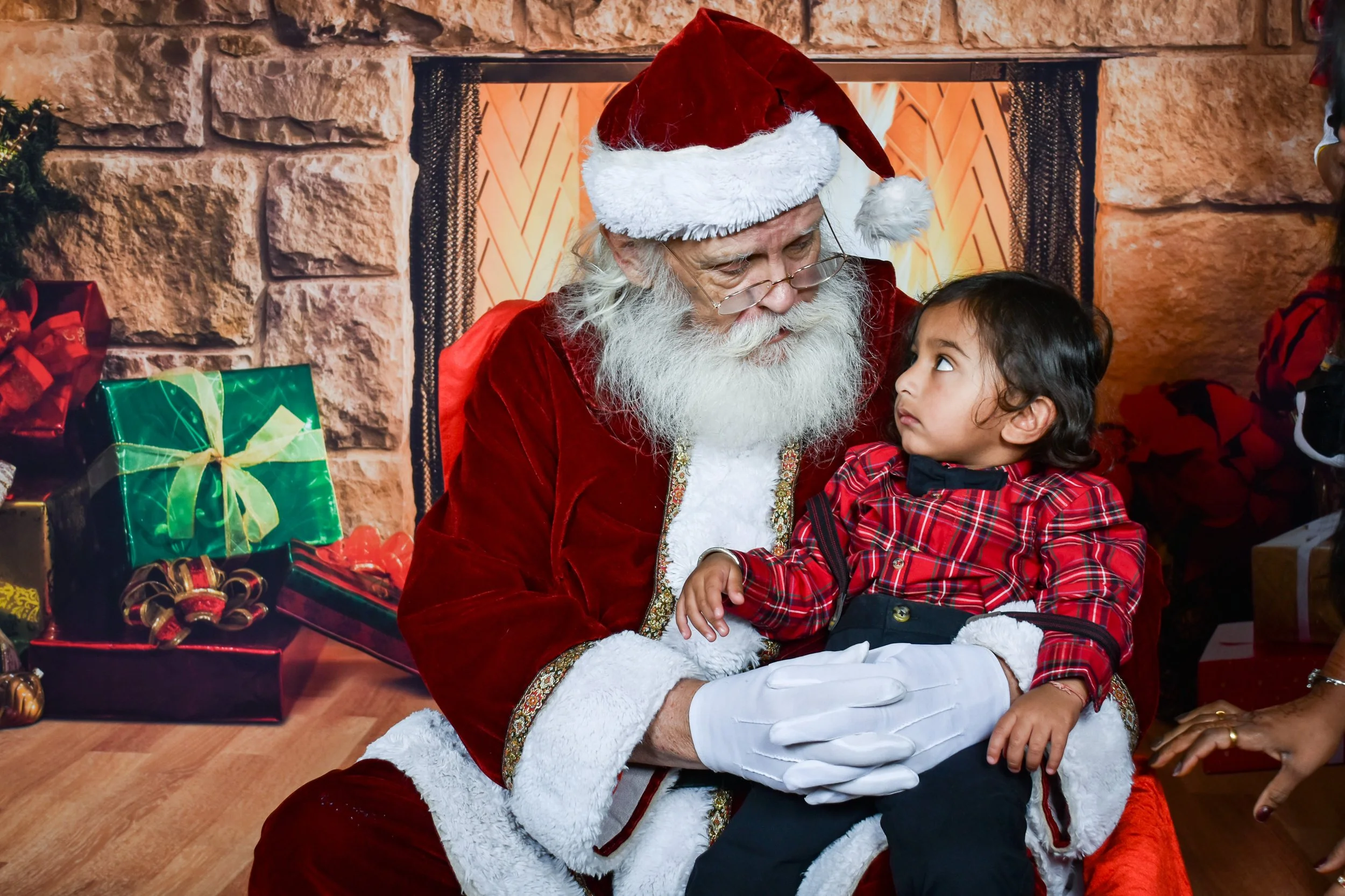 Team Remo Photos with Santa 2025 - Patel Family 4.jpg