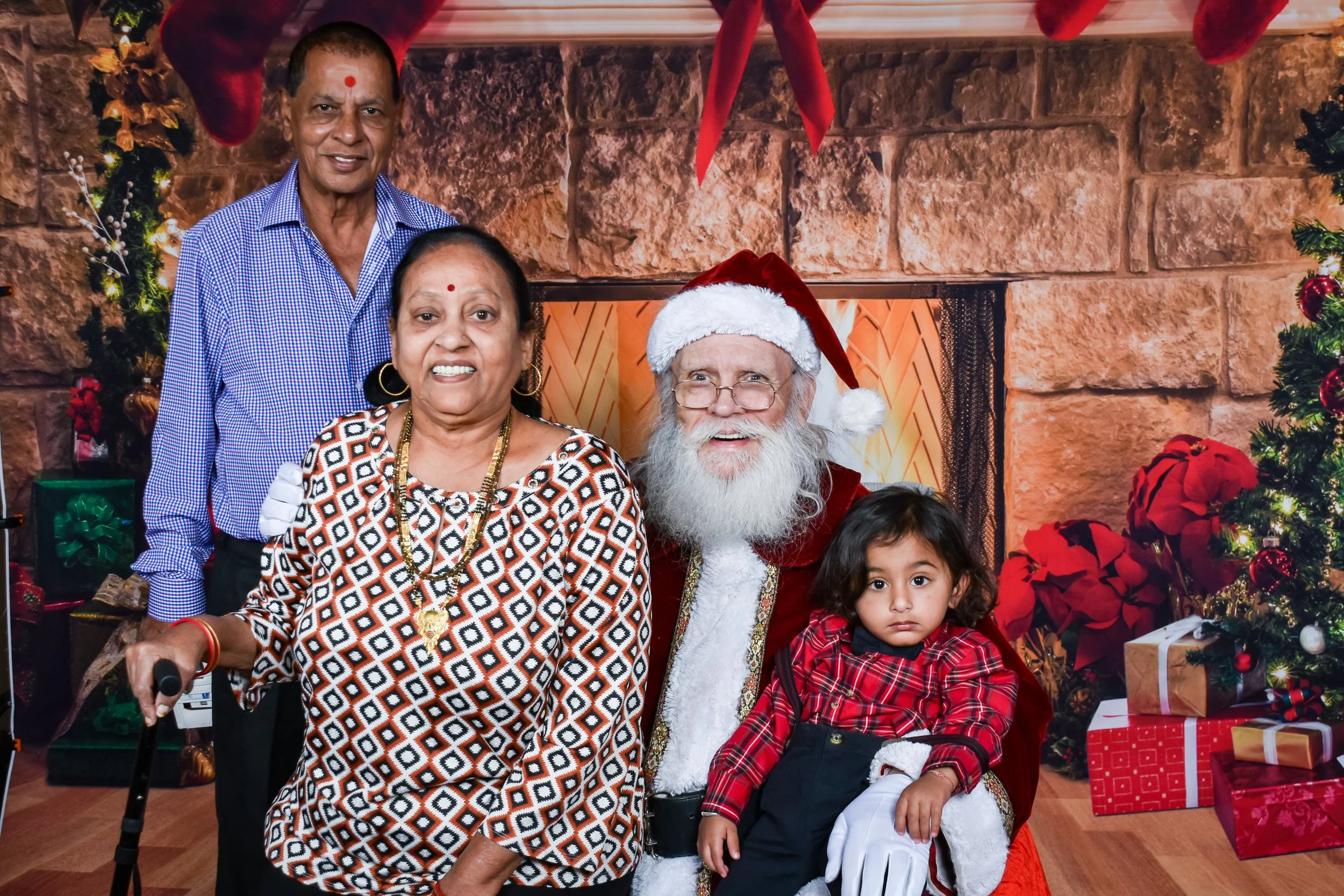 Team Remo Photos with Santa 2025 - Patel Family 5.jpg