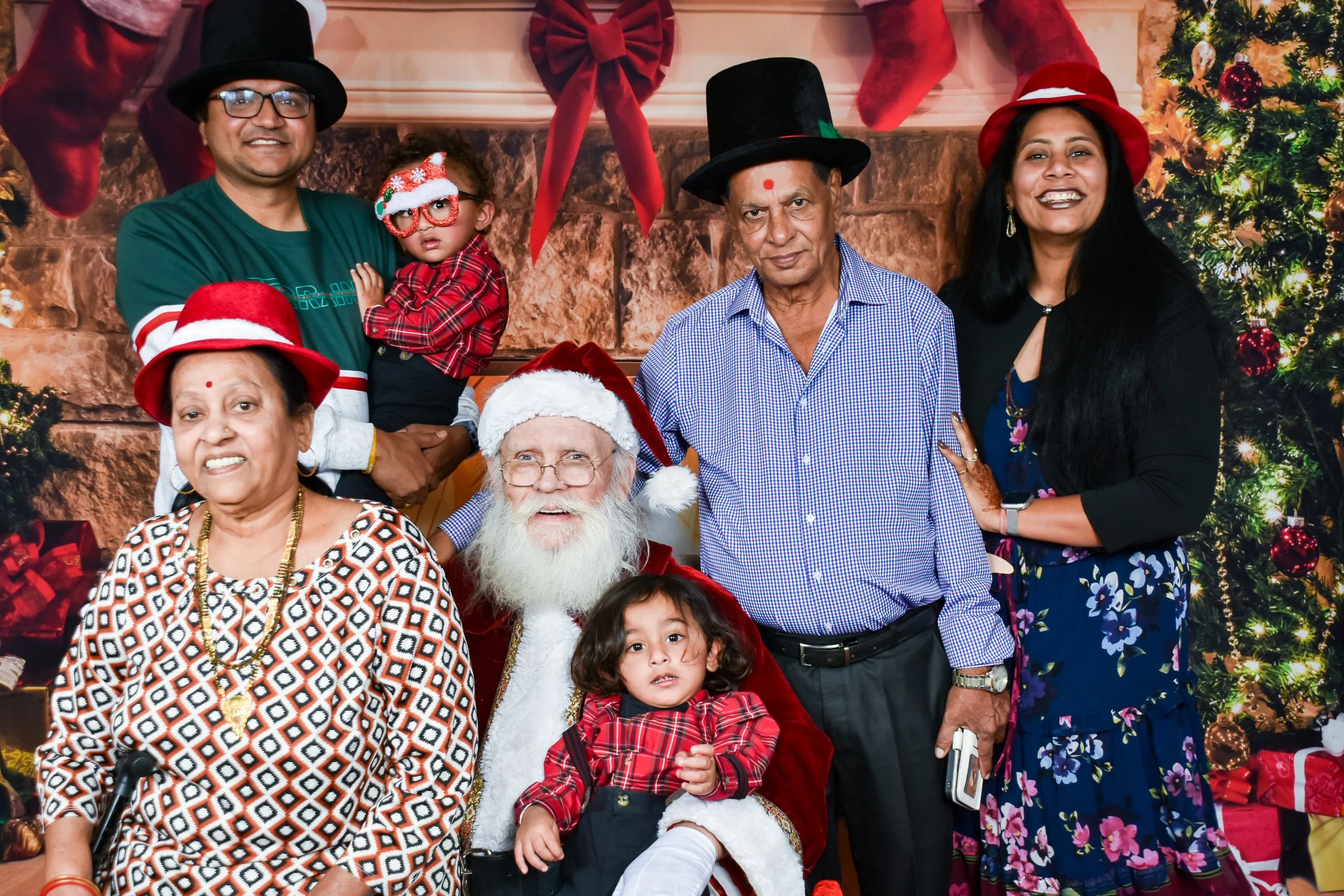 Team Remo Photos with Santa 2025 - Patel Family 6.jpg