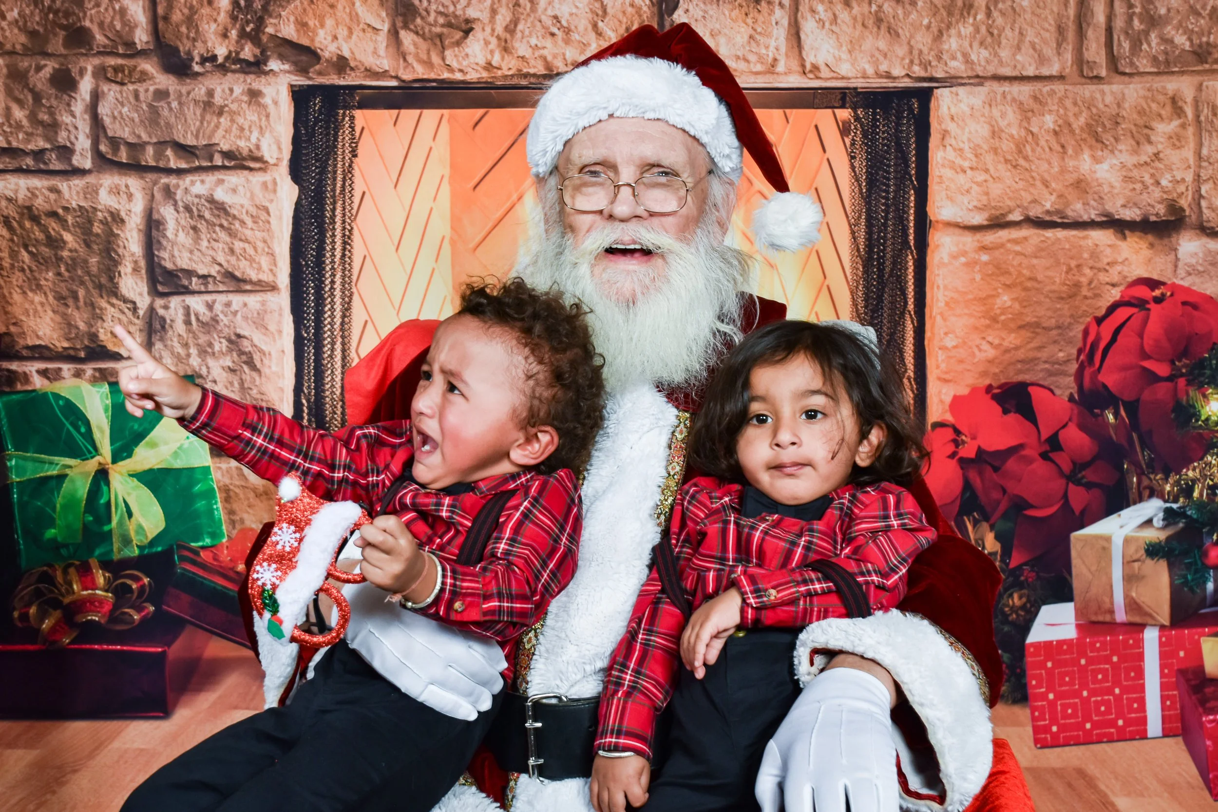 Team Remo Photos with Santa 2025 - Patel Family 8.jpg
