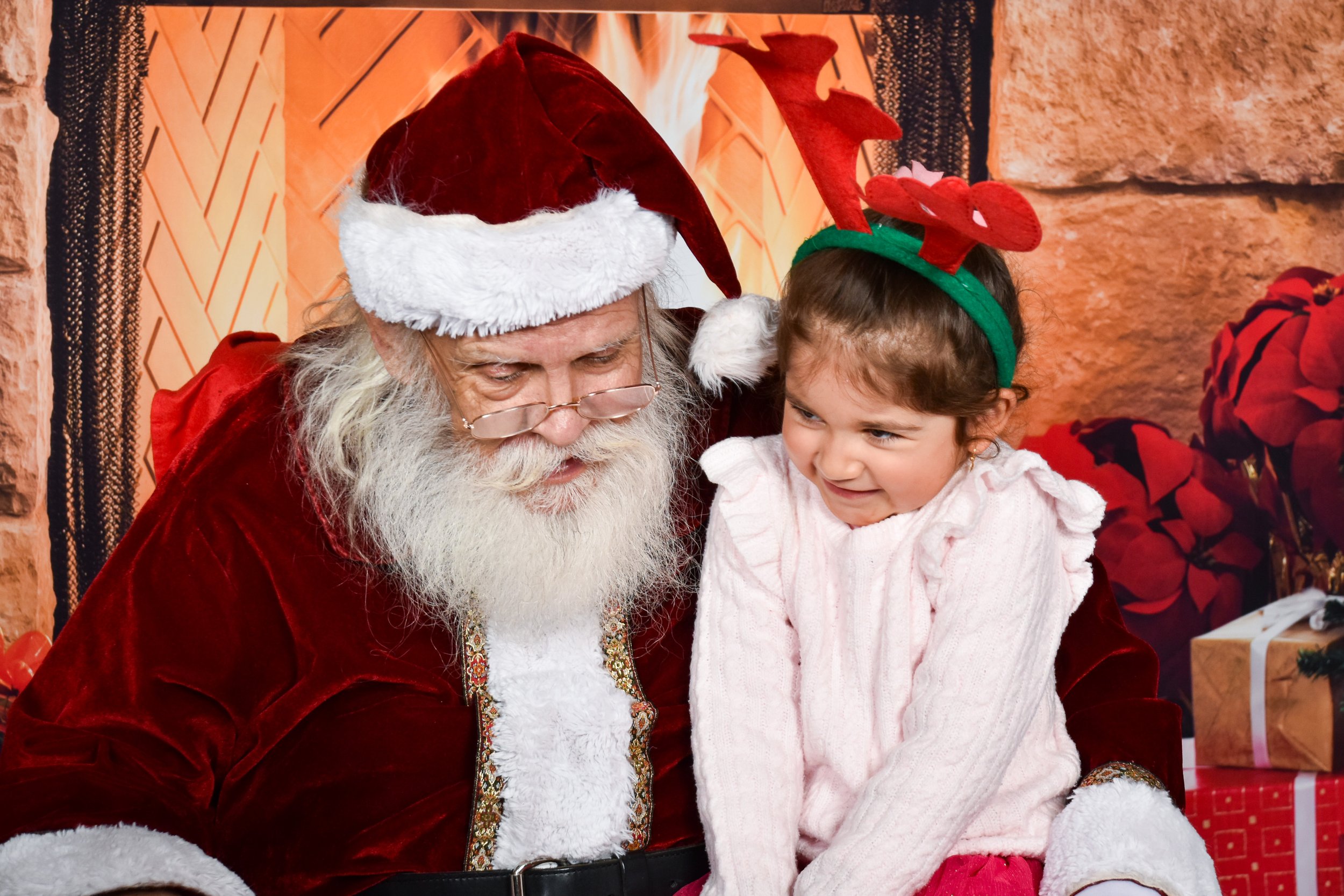 Team Remo Photos with Santa 2025 - Pedrego Family 1.jpg