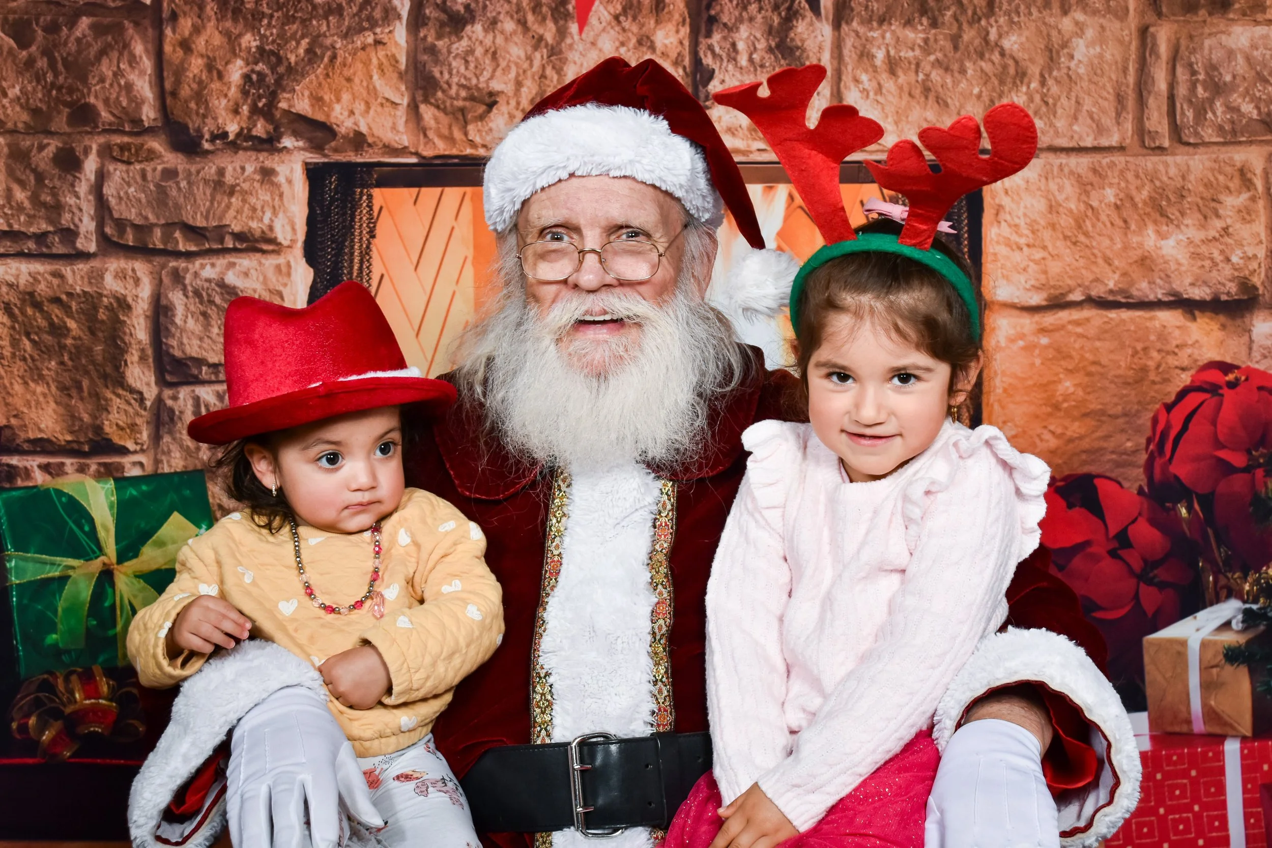 Team Remo Photos with Santa 2025 - Pedrego Family 2.jpg