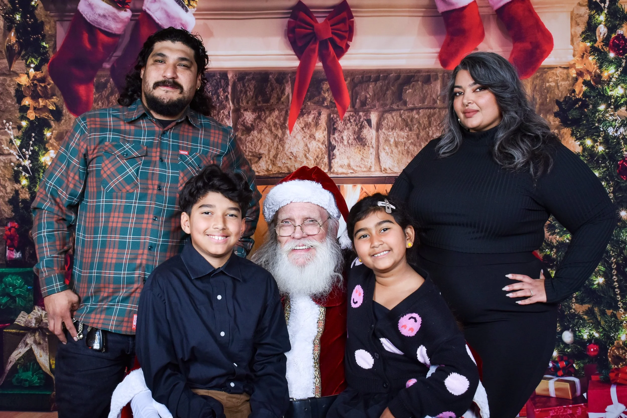 Team Remo Photos with Santa 2025 - Ramirez-Meadows Family 2.jpg