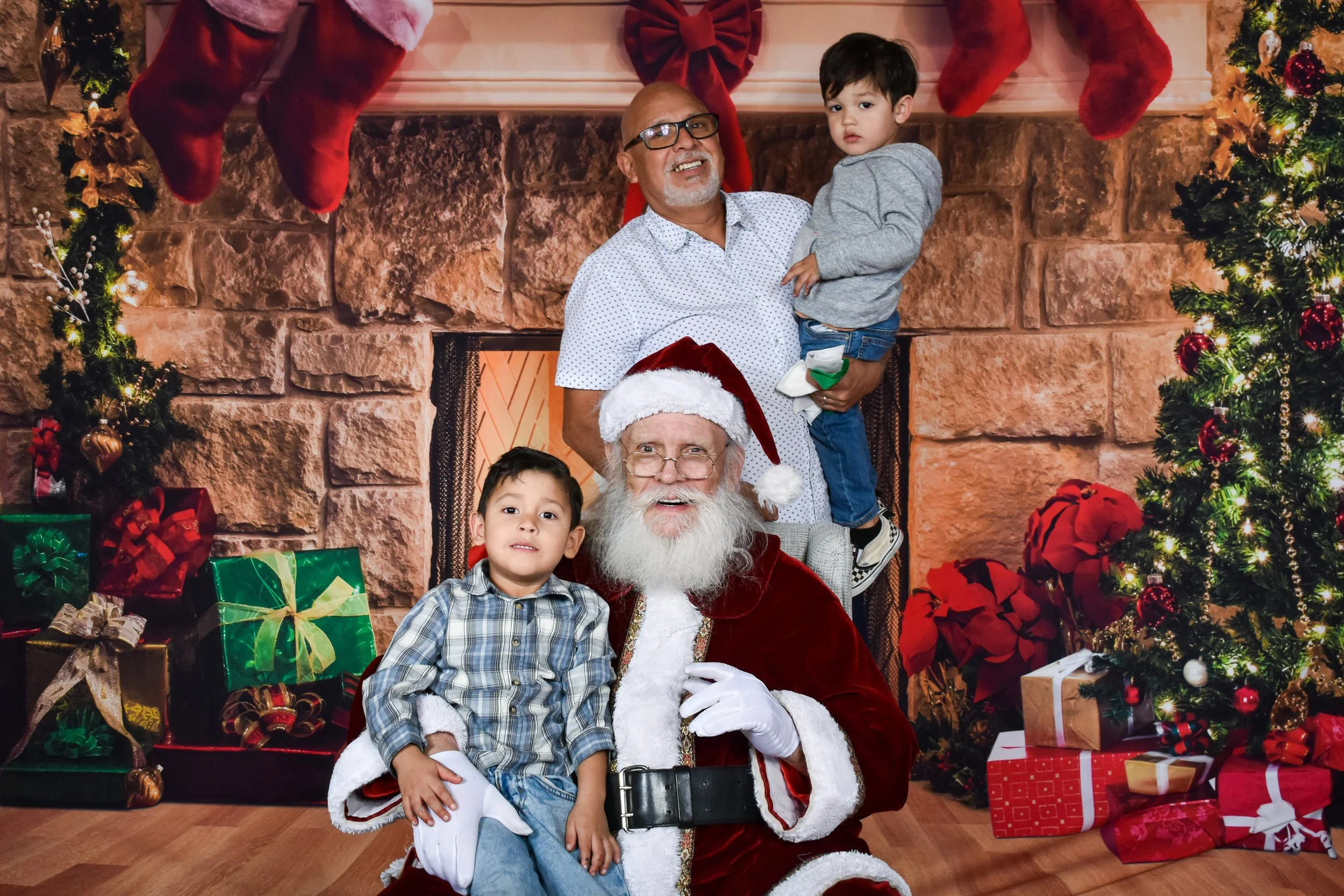 Team Remo Photos with Santa 2025 - Ramon's Family 1.jpg