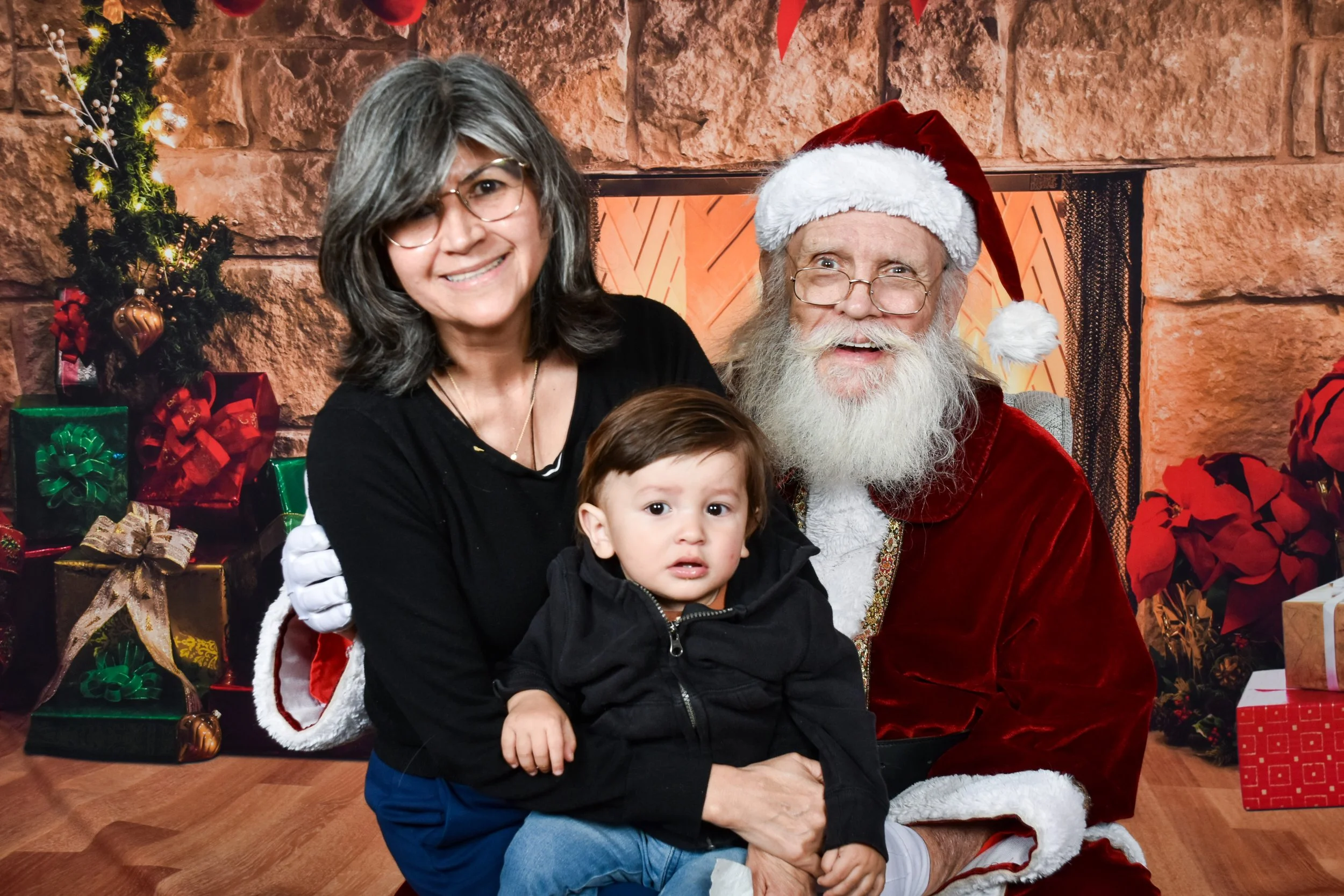 Team Remo Photos with Santa 2025 - Ramon's Family 5.jpg