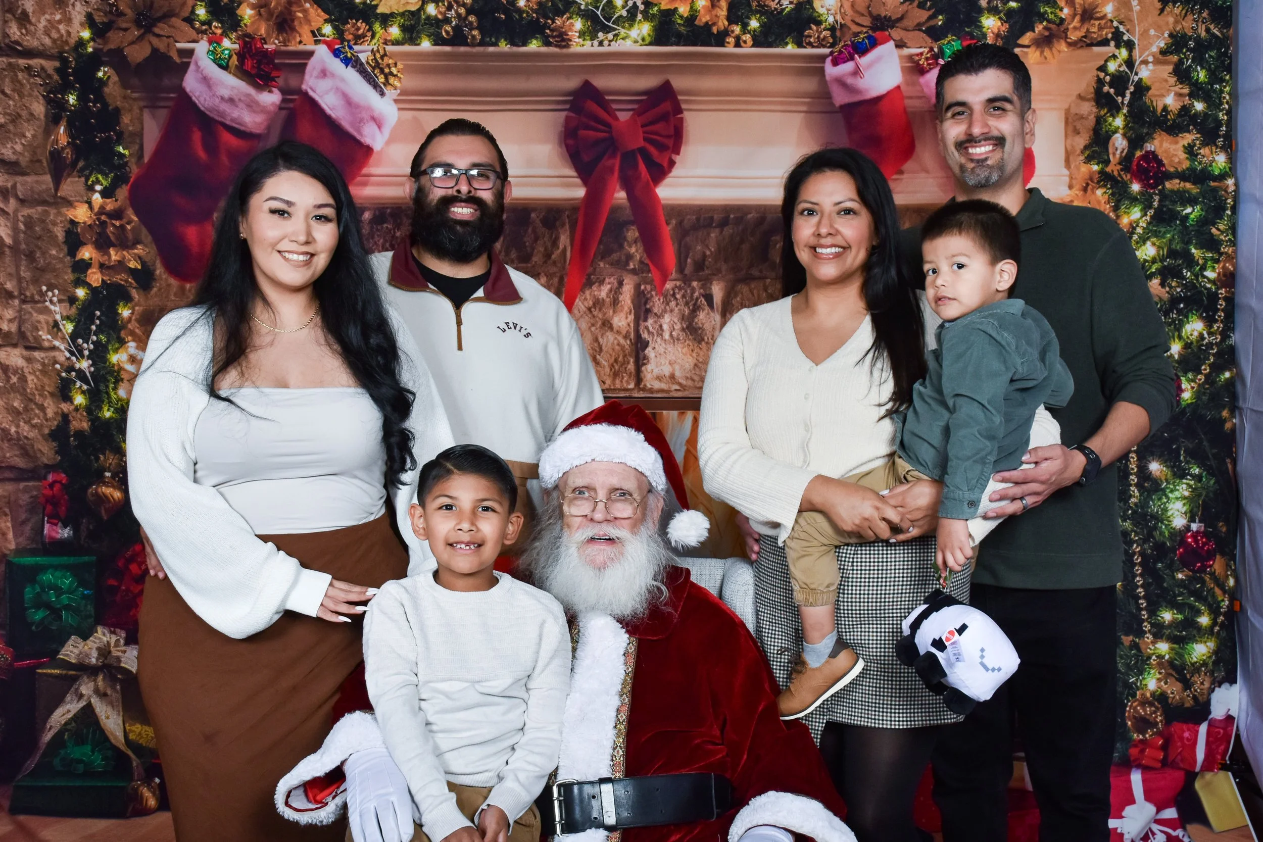 Team Remo Photos with Santa 2025 - Ruano Family.jpg
