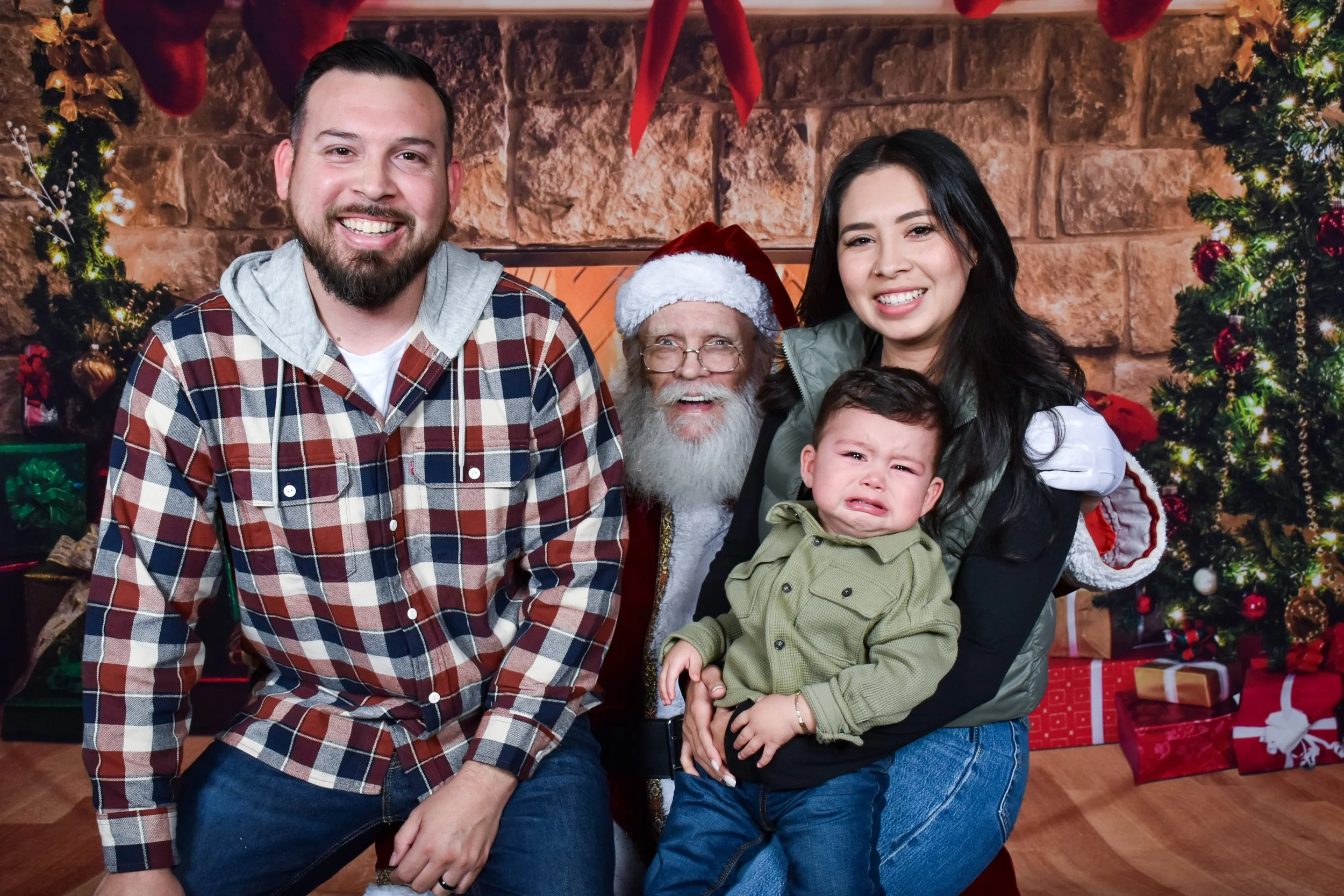 Team Remo Photos with Santa 2025 - Saldana Family 1.jpg