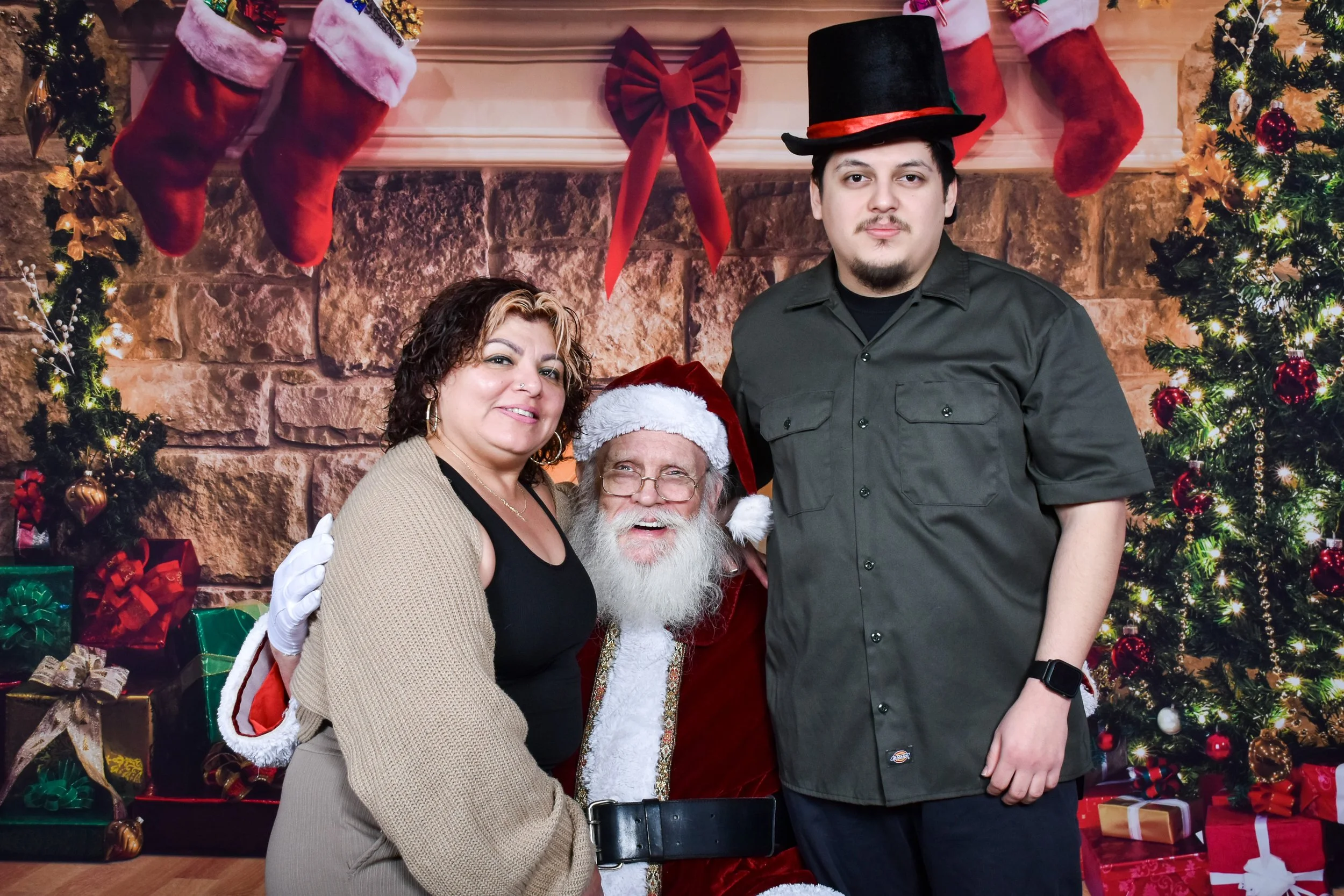 Team Remo Photos with Santa 2025 - Sanchez Family 2.jpg