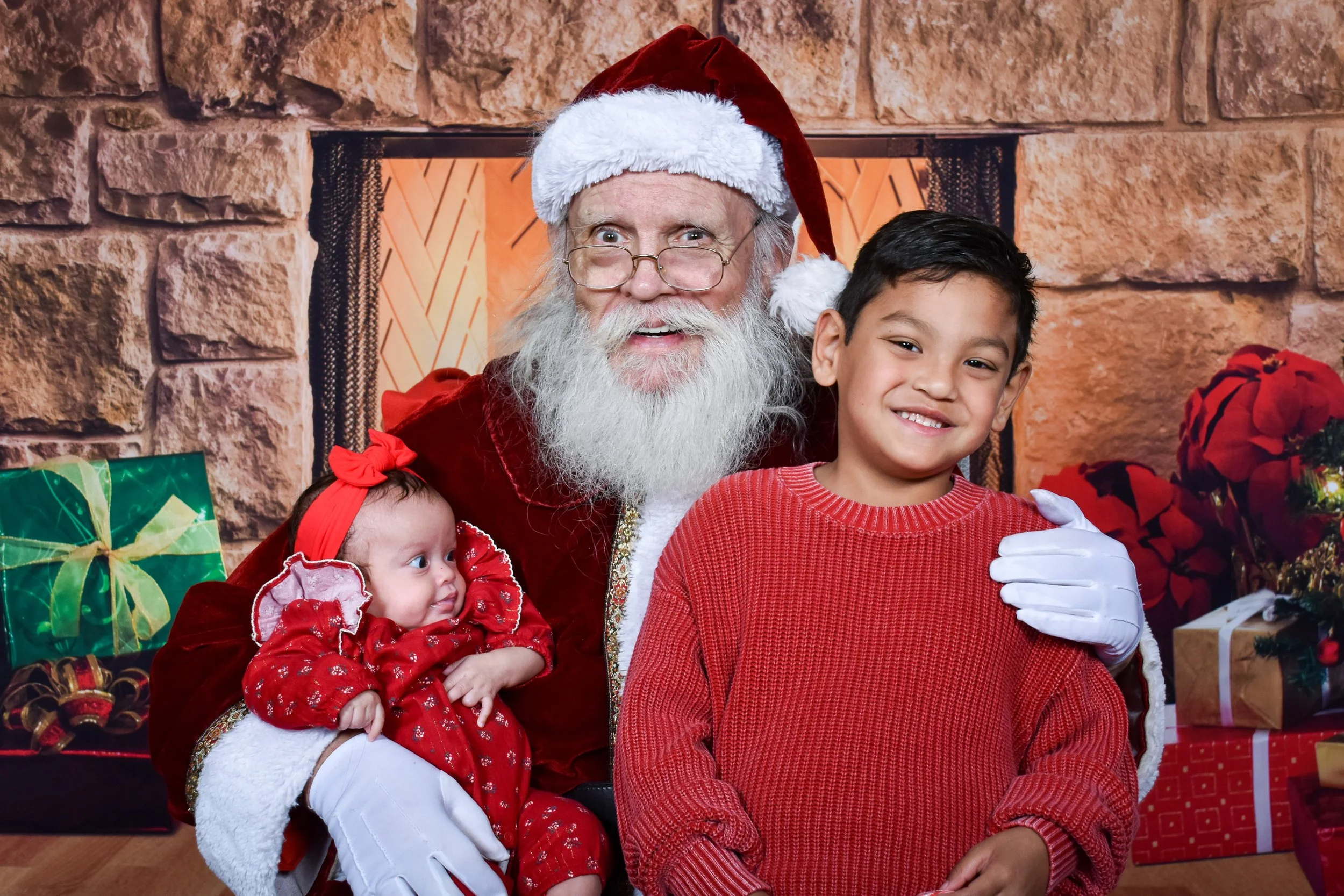Team Remo Photos with Santa 2025 - Uribe-Kong Family 3.jpg