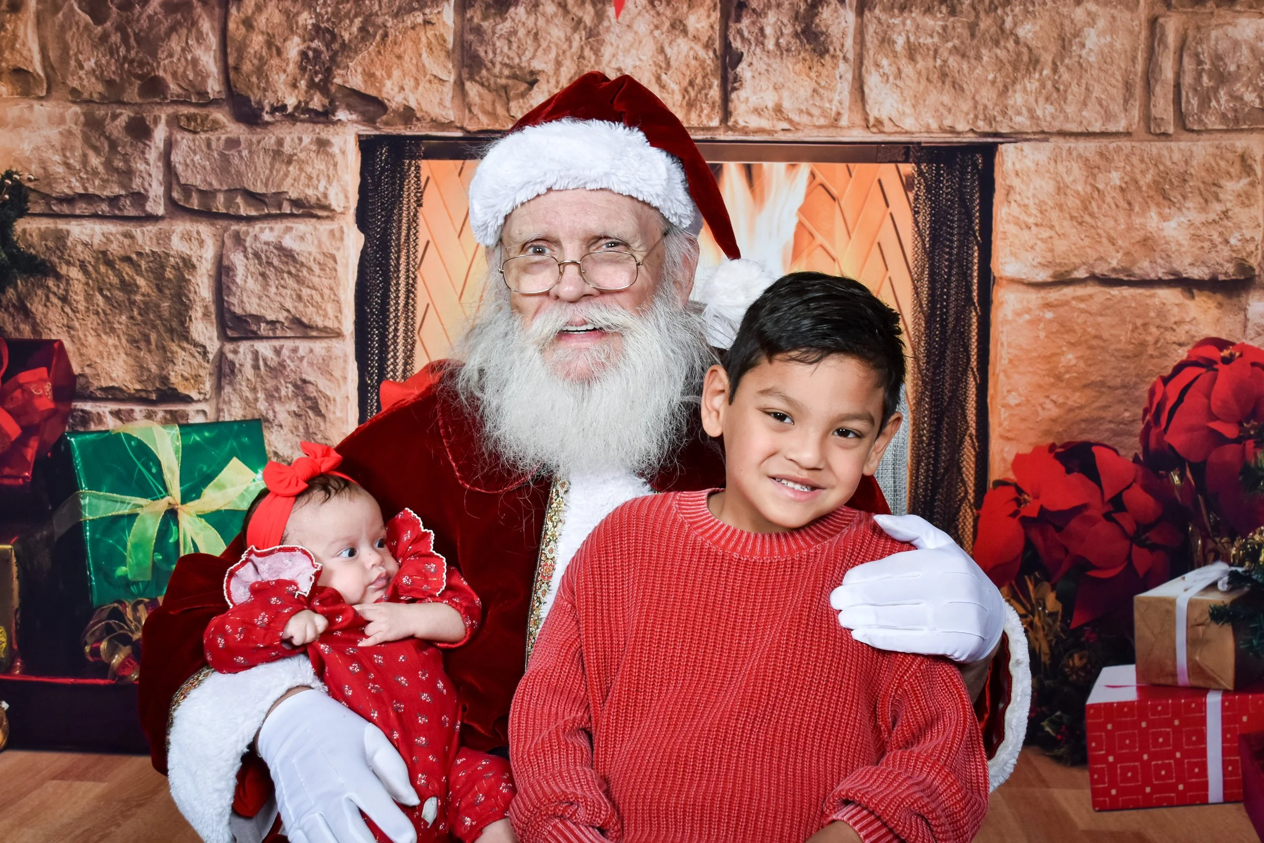 Team Remo Photos with Santa 2025 - Uribe-Kong Family 5.jpg