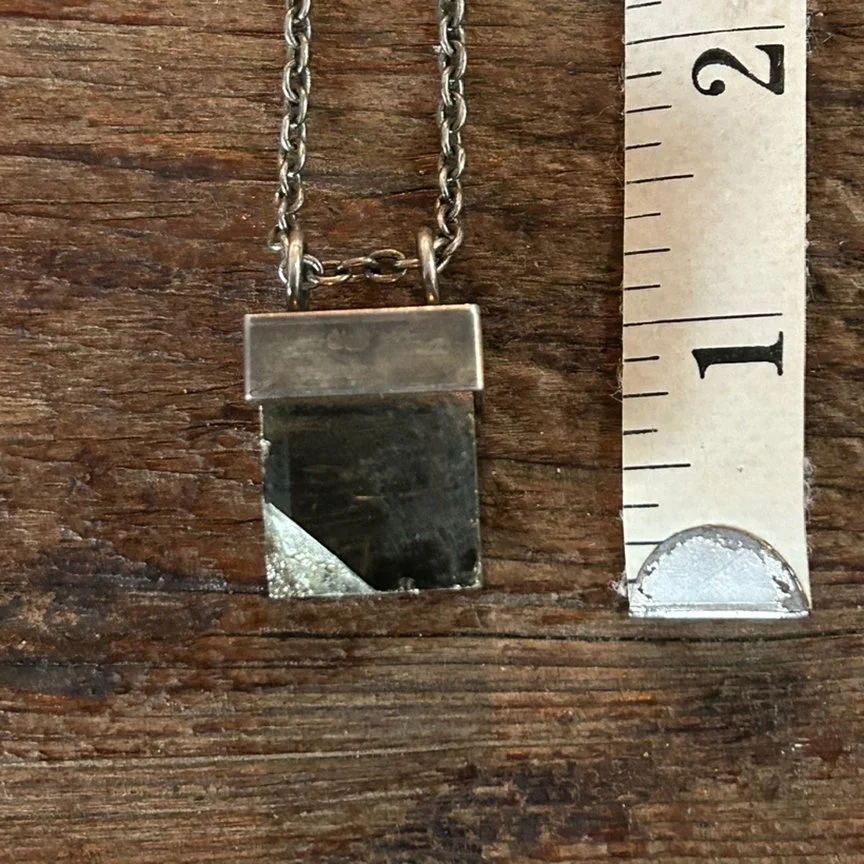 roseblack_2025_pyrite_ruler.jpg
